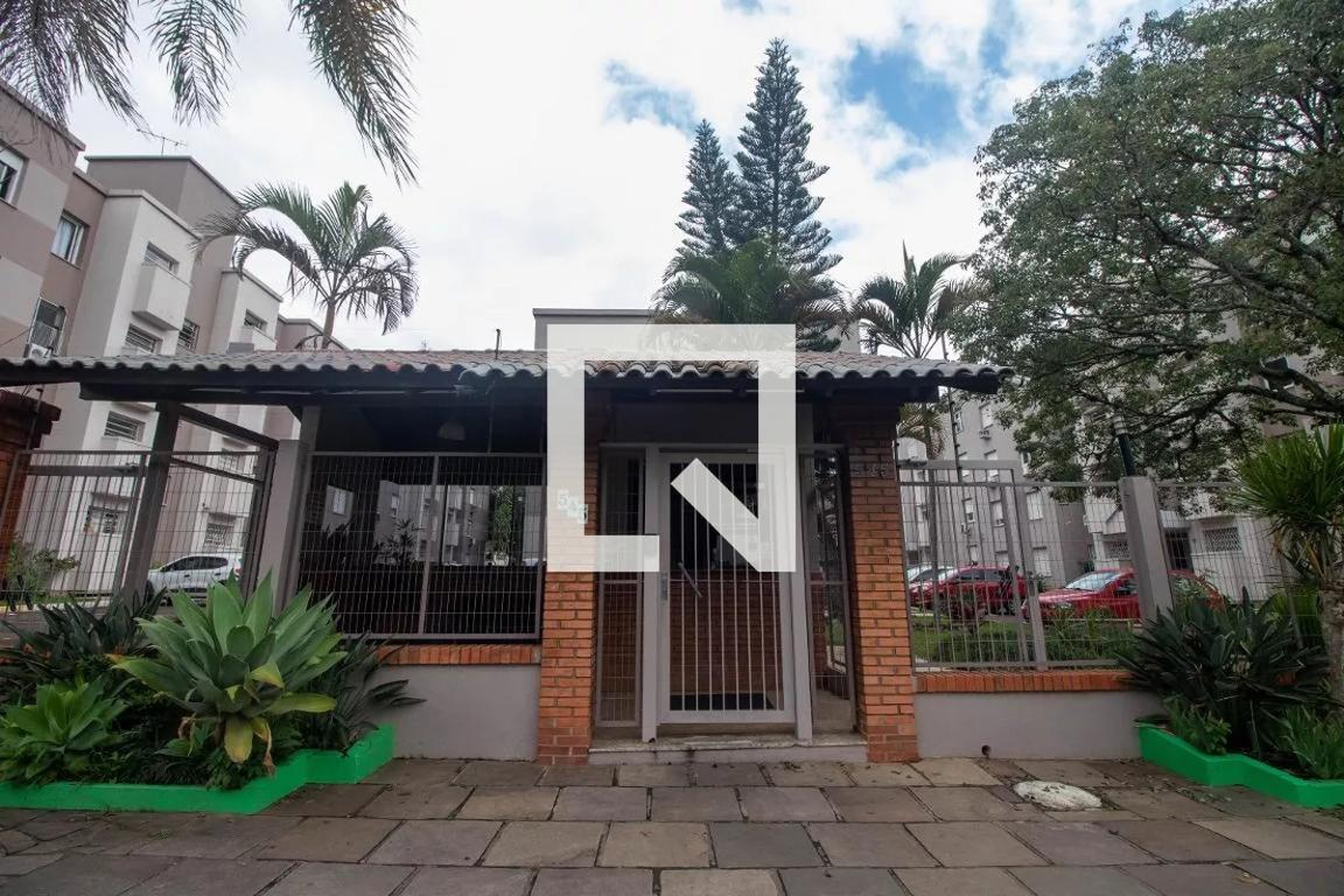 Fachada do Condomínio Condomínio Parque do Sabia