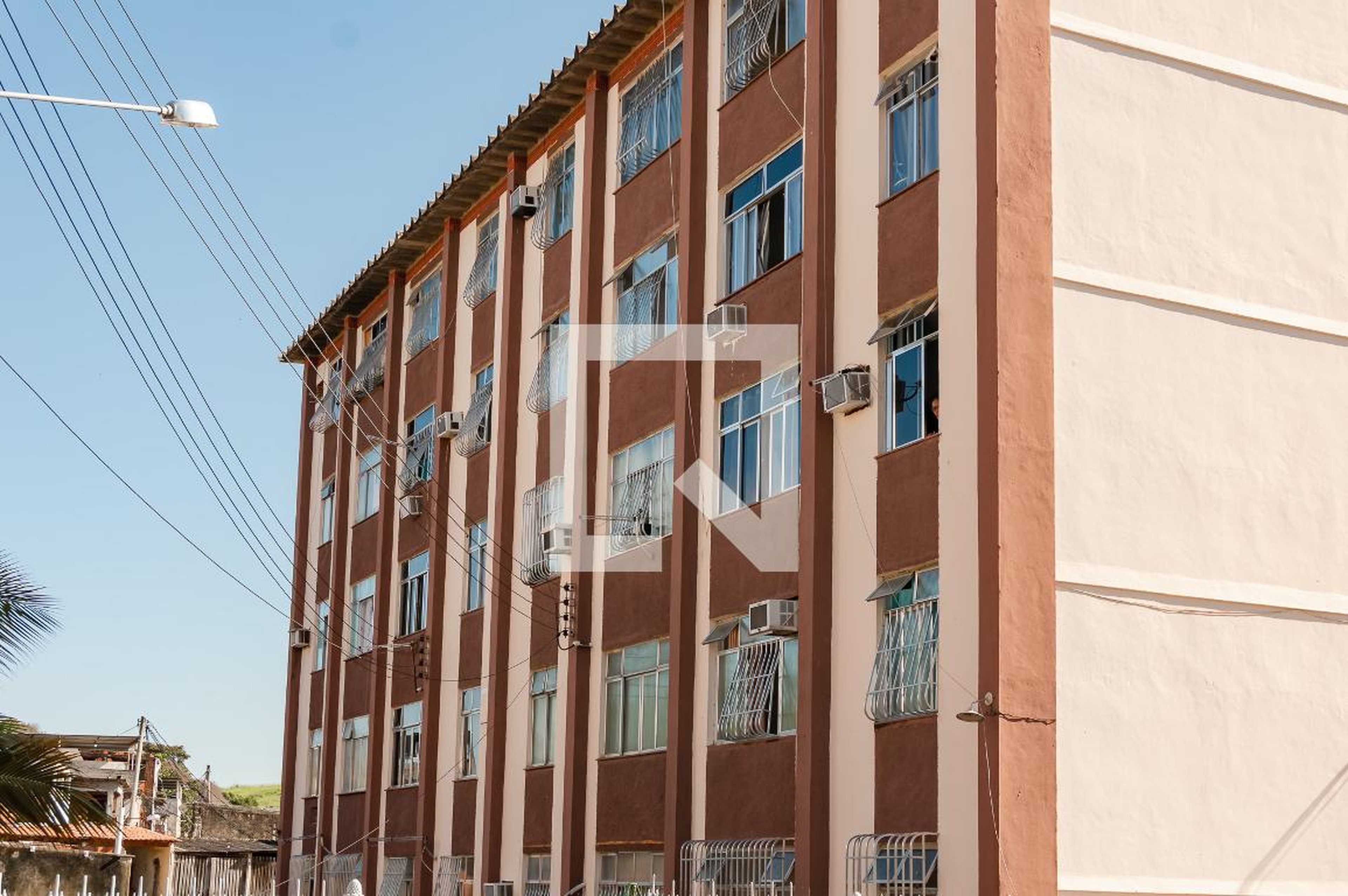 Fachada Condomínio em Rua Amerino Vanick, 94