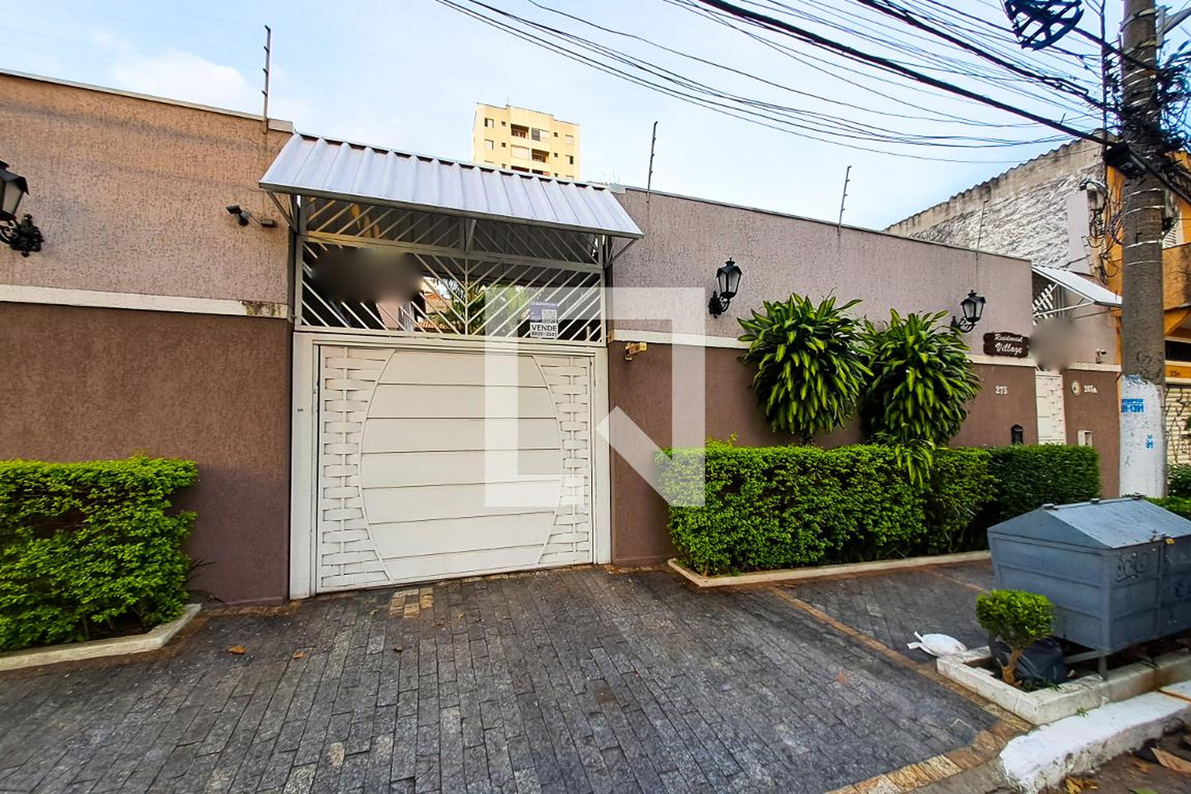 Fachada Residencial Village