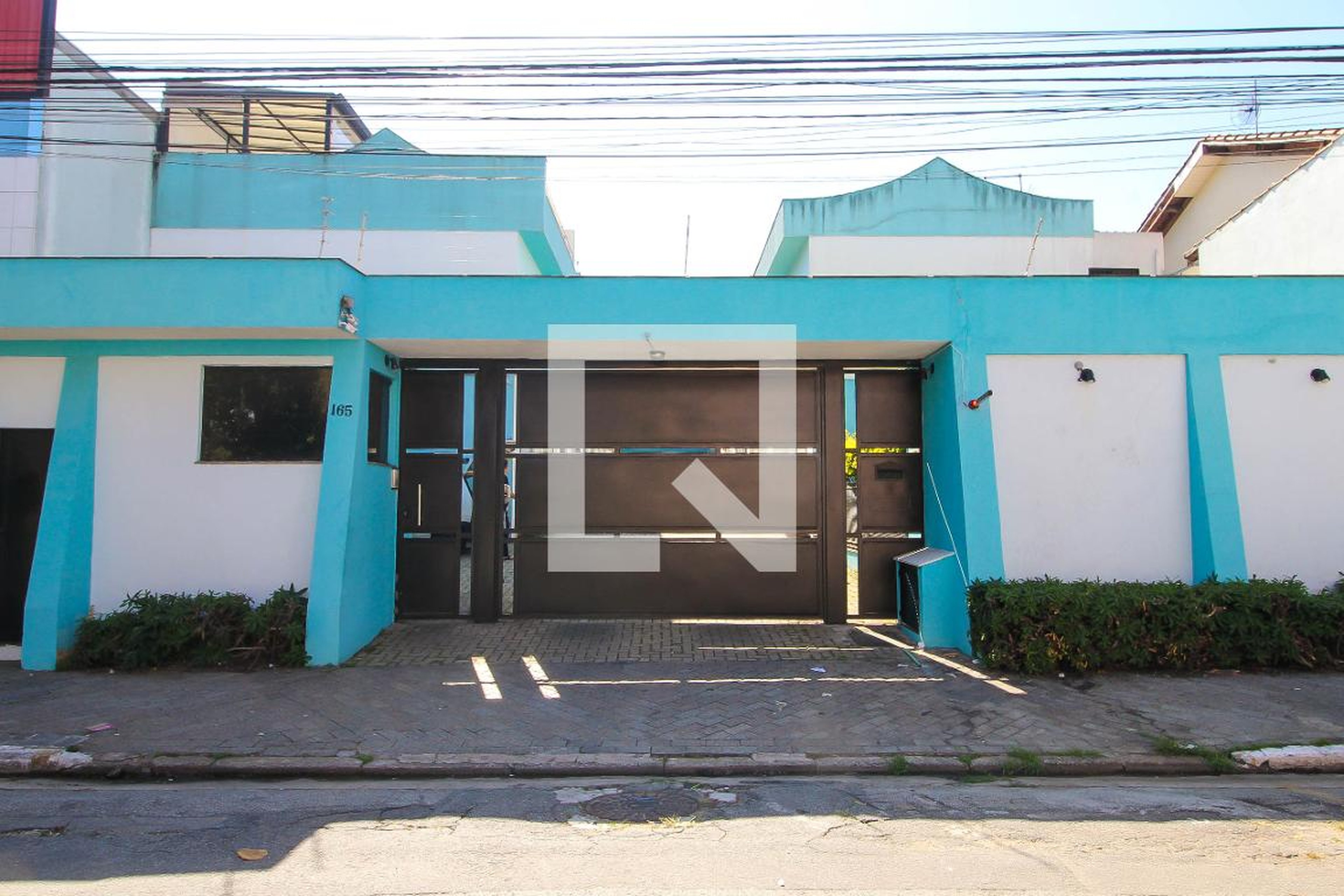 Fachada Condomínio em Rua Secundino Domingues, 165