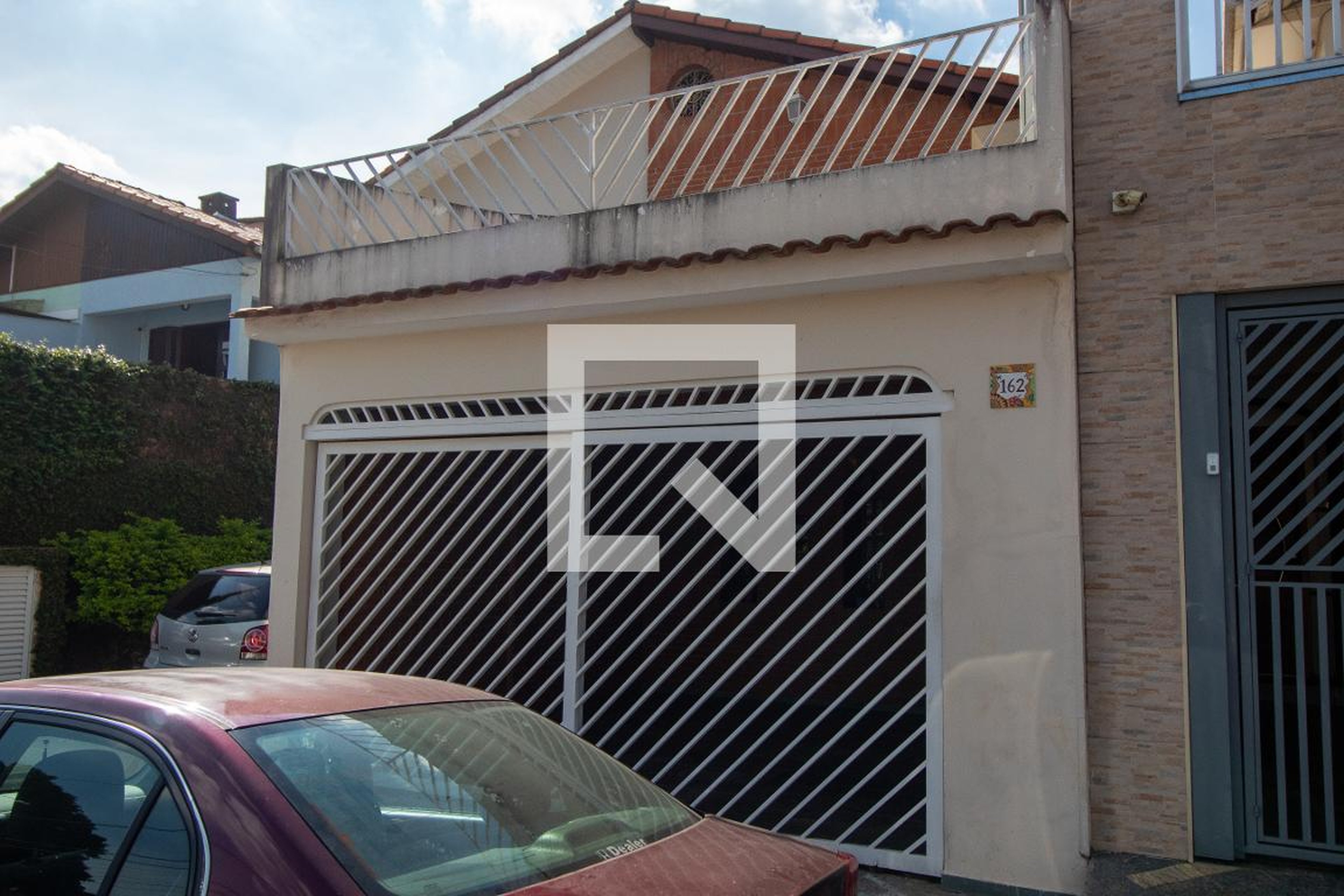 Fachada Condomínio em Rua Dionísio Pedrellini, 162