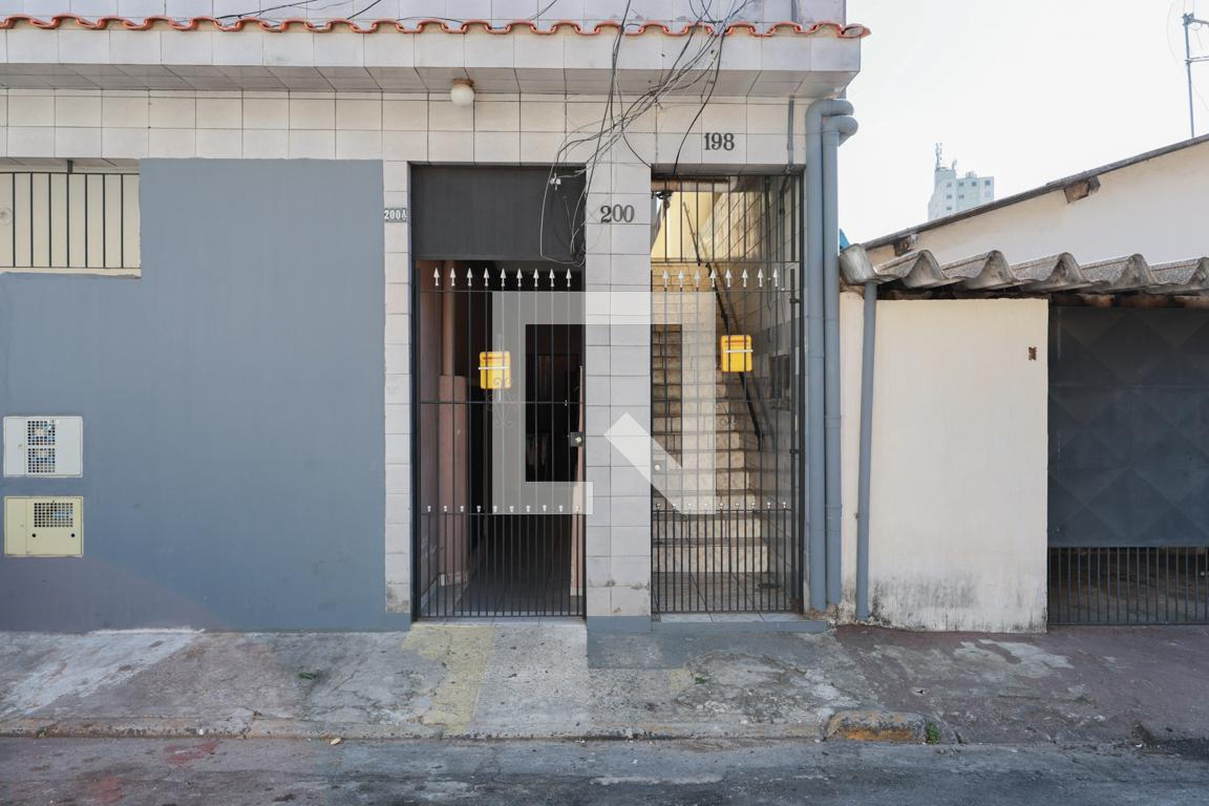 Fachada Condomínio em Rua Genésio Murta, 200