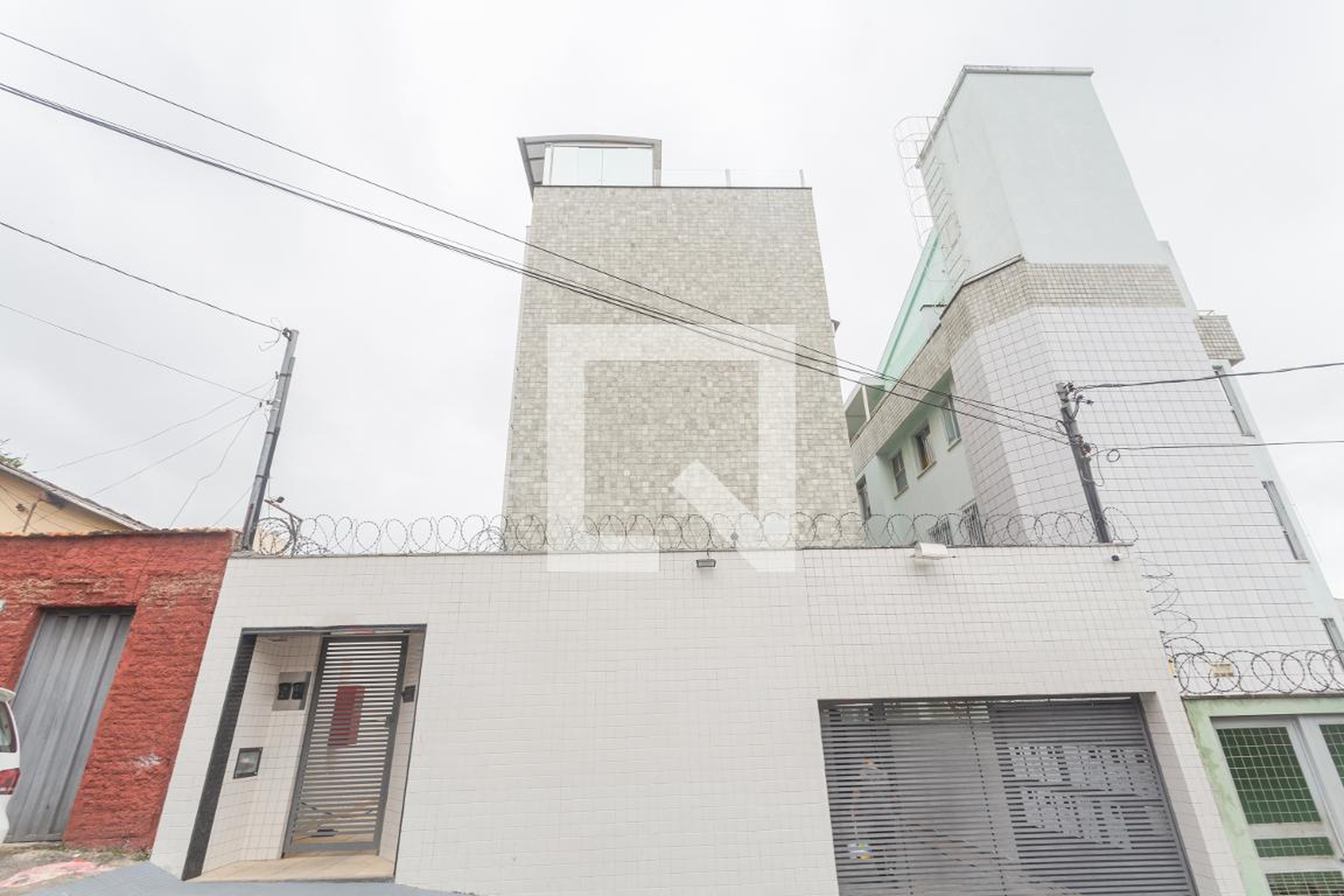 Fachada Condomínio em Rua Genoveva de Souza, 1761