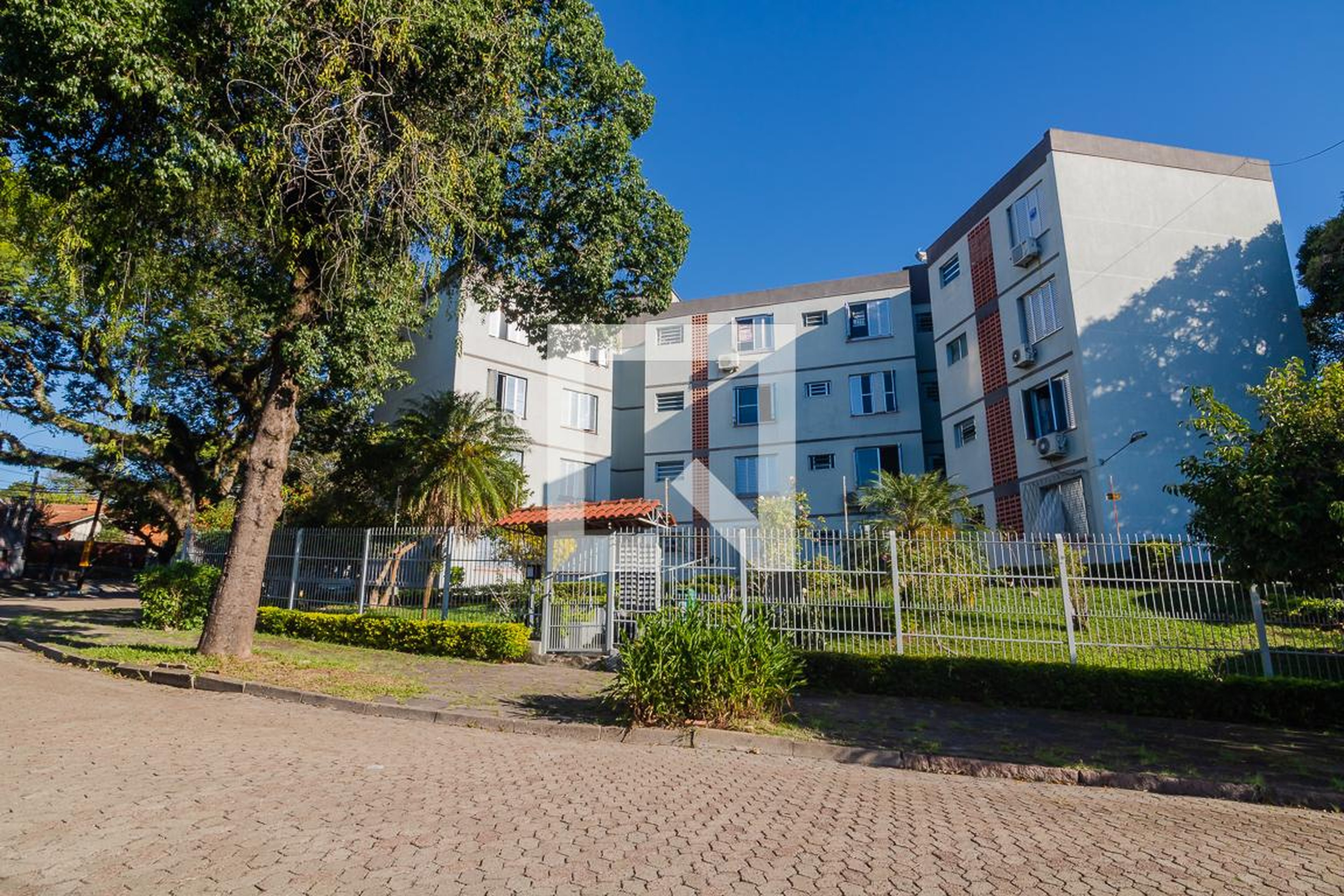 Fachada Condomínio em Rua Hipólito da Costa, 201