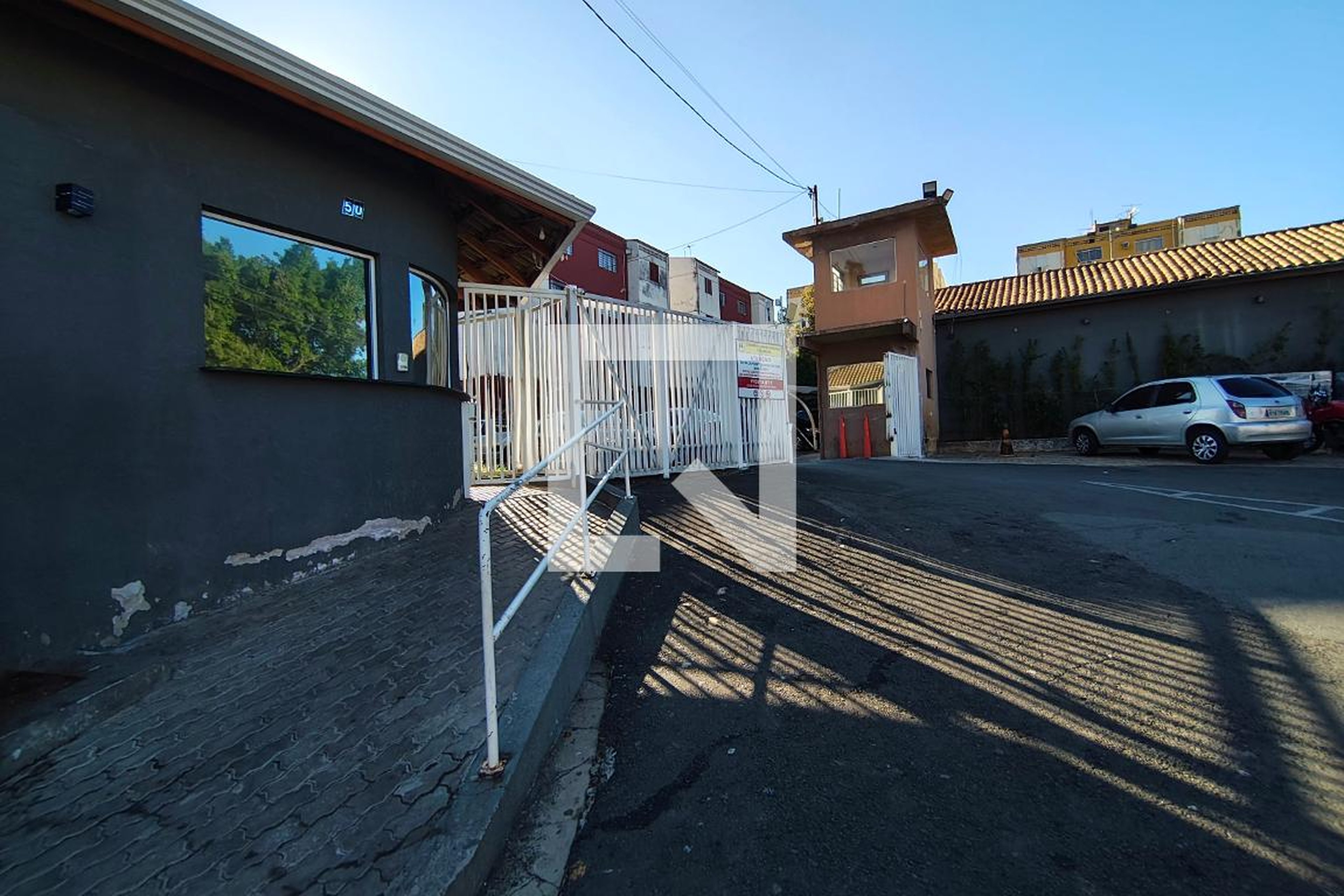 Fachada do Condomínio Condomínio Primavera 1