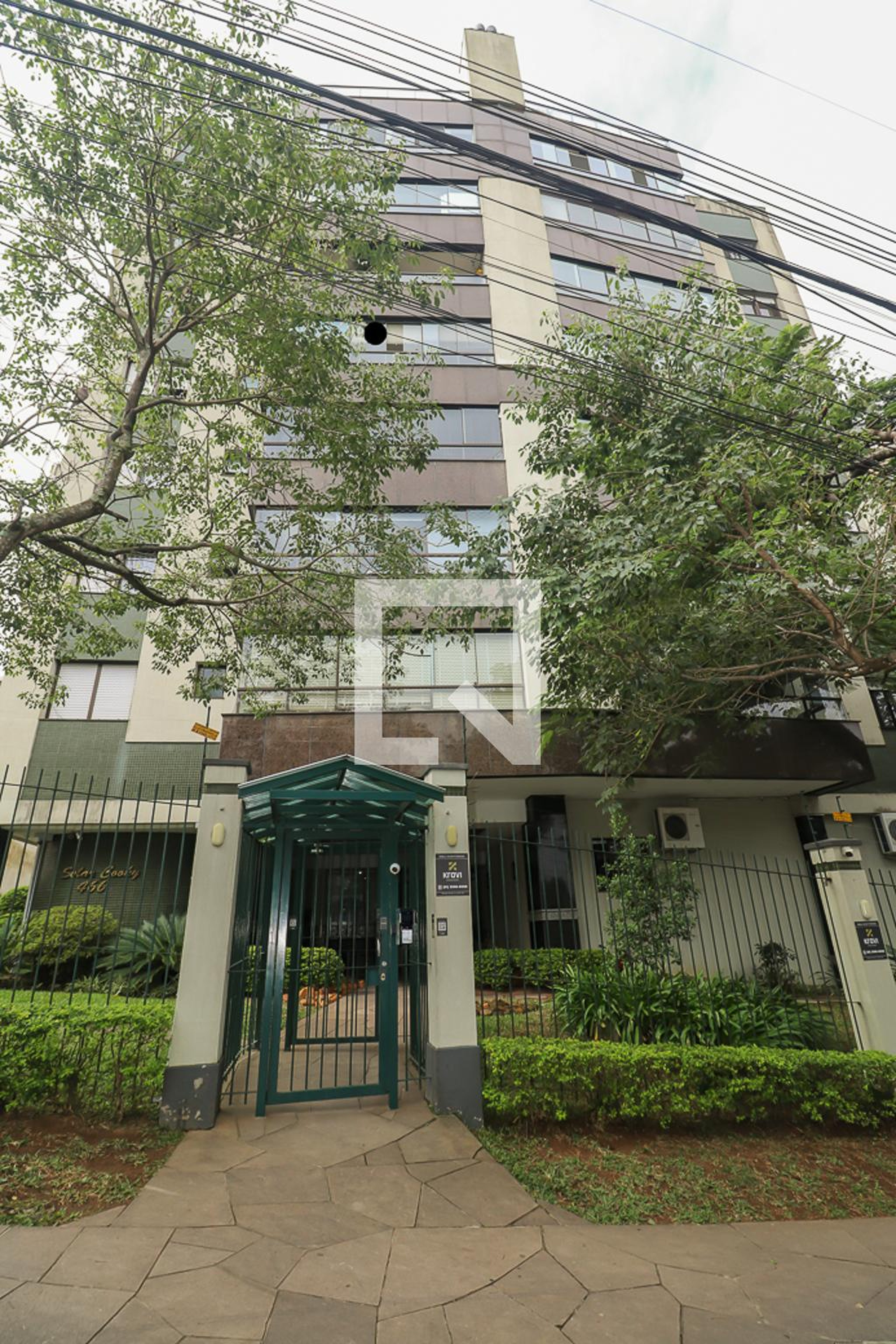 Fachada Condomínio em Rua Faria Santos, 466