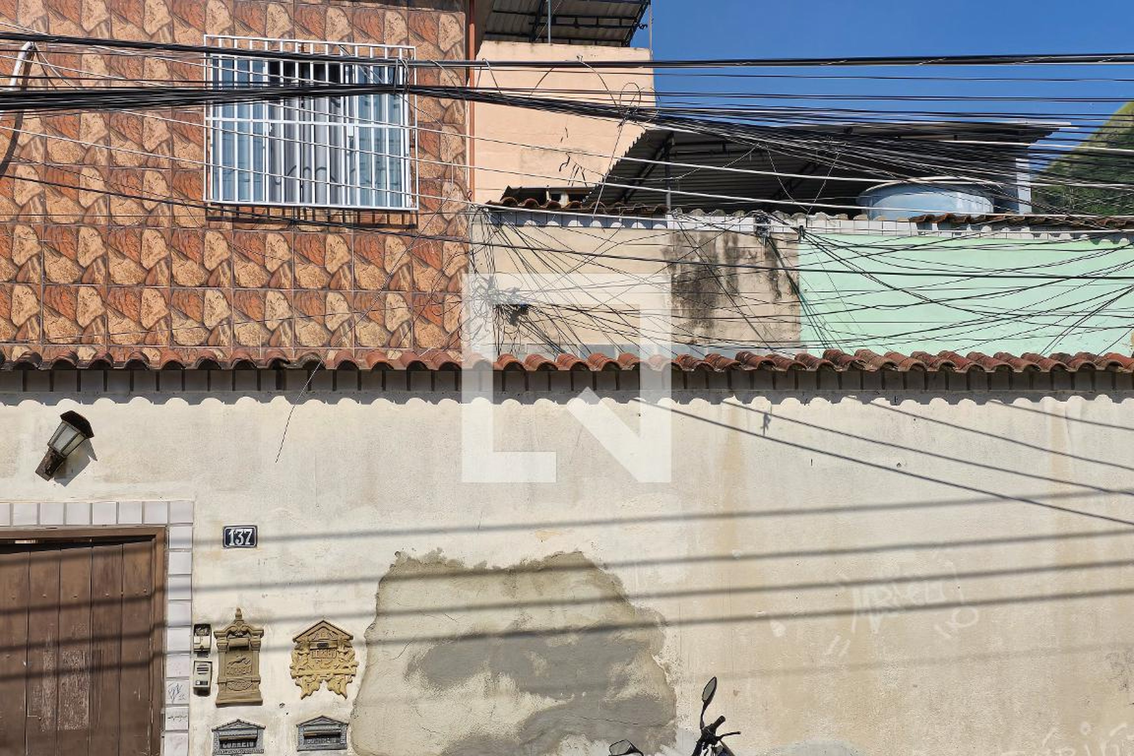 Fachada Condomínio em Rua Joaquim Soares, 137