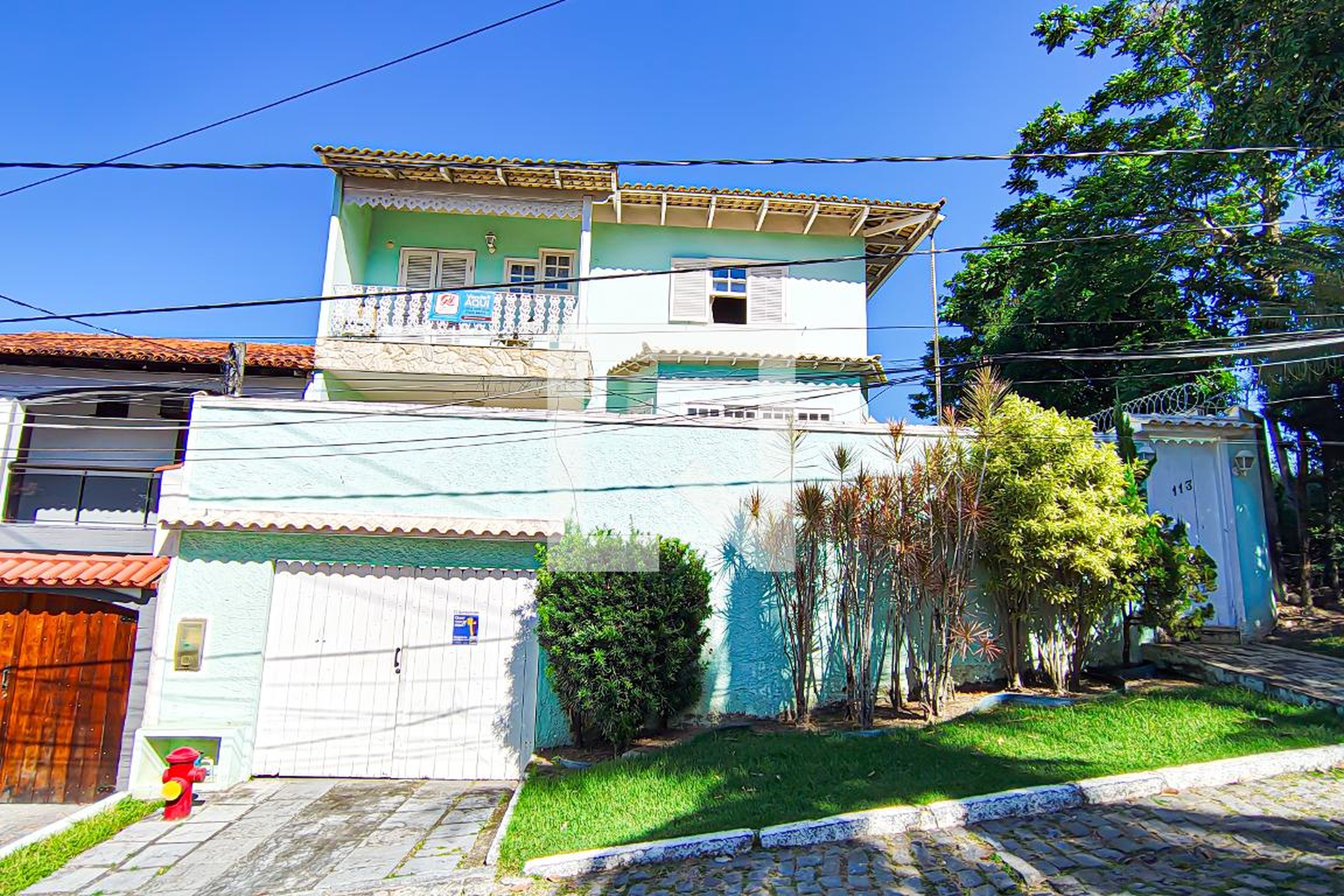 fachada Condomínio em Rua Getúlio de Moura, 113