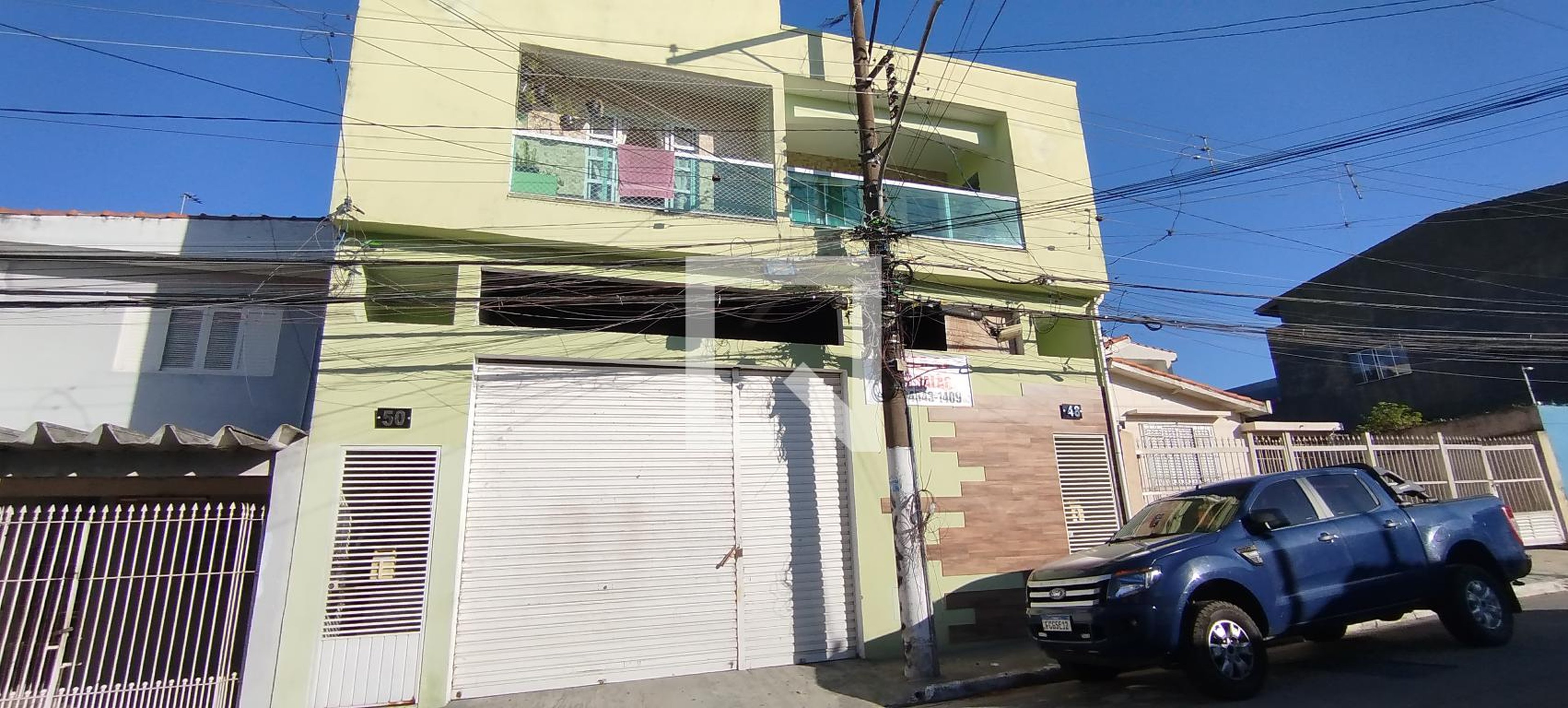 Fachada Condomínio em Rua Cunha de Carvalho, 50