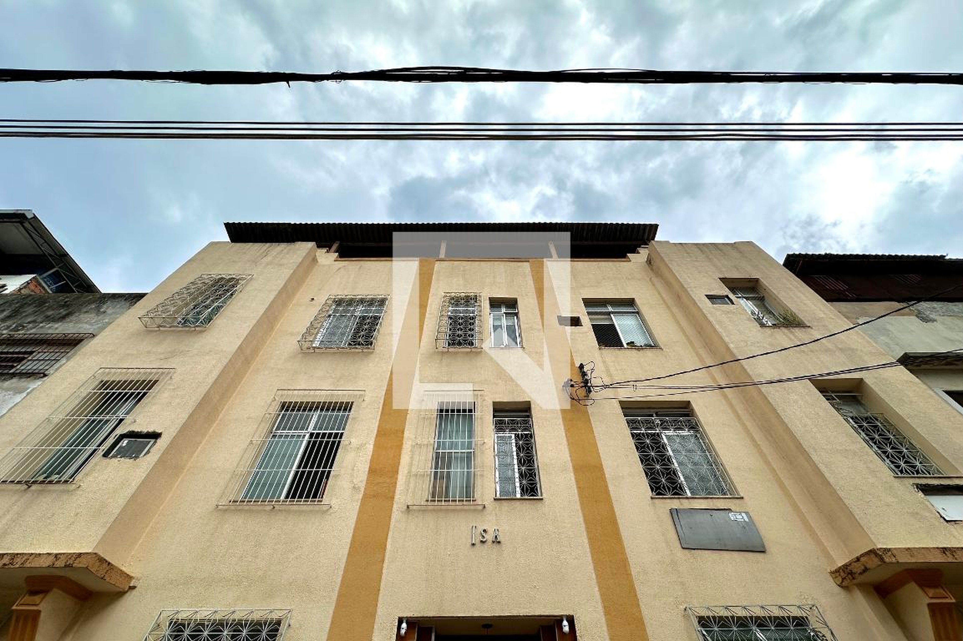 Fachada Condomínio em Travessa Almirante Protógenes Guimarães, 60