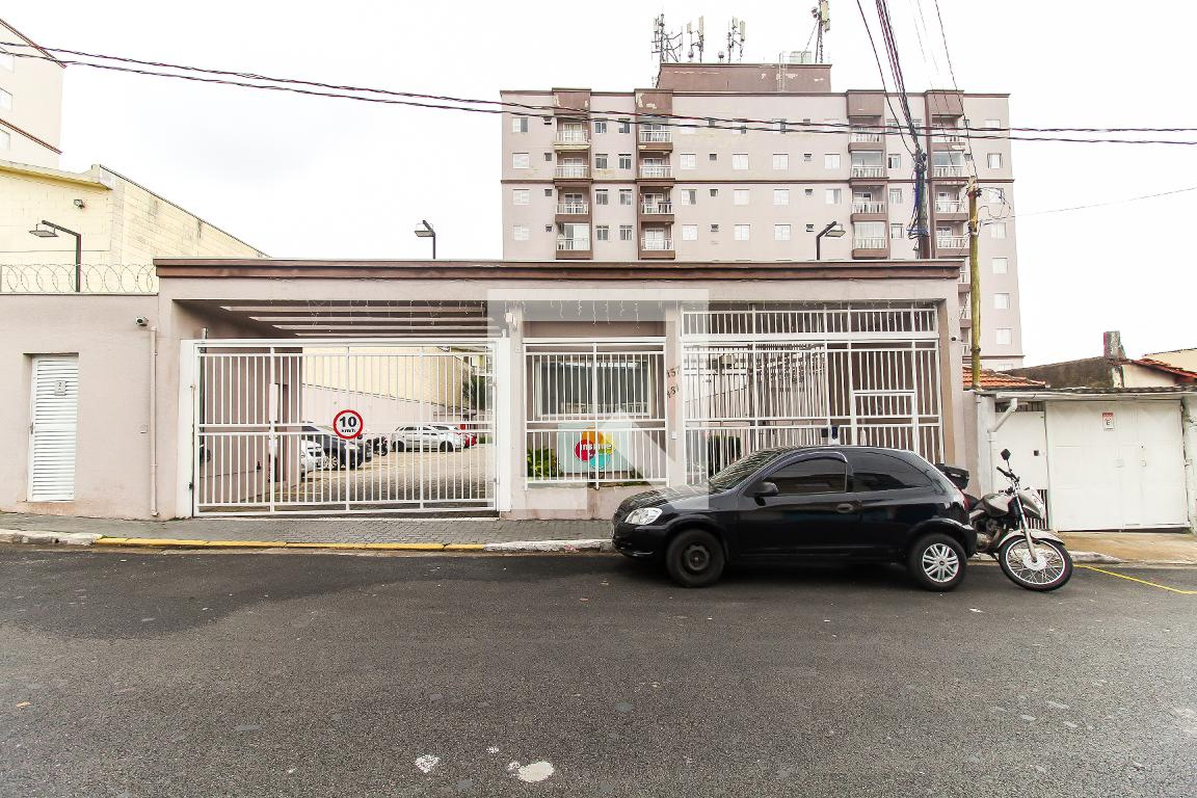 Fachada Condomínio em Rua Coronel Rodolfo Porto, 188
