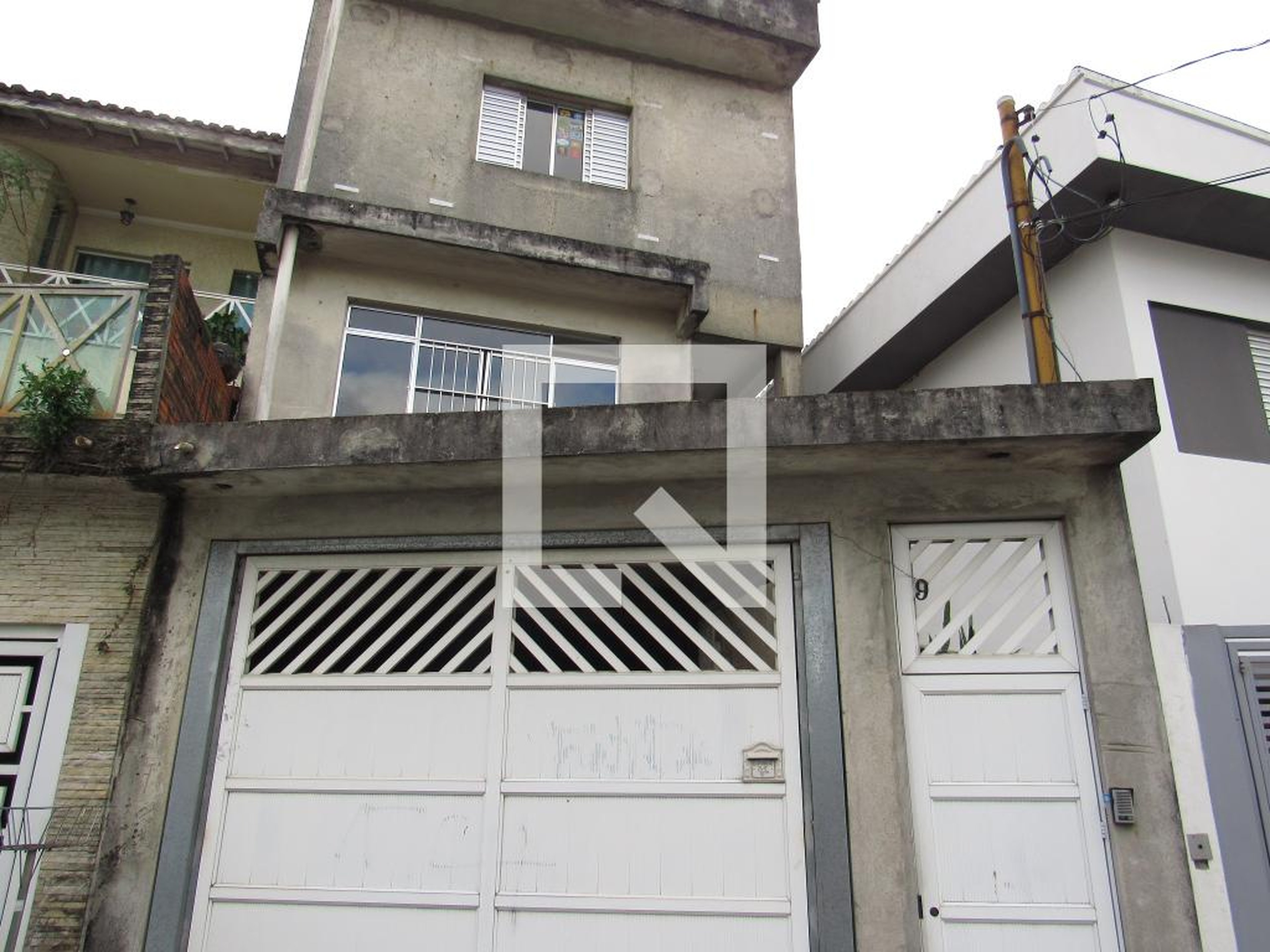 Fachada Condomínio em Rua Augusto Teixeira, 9