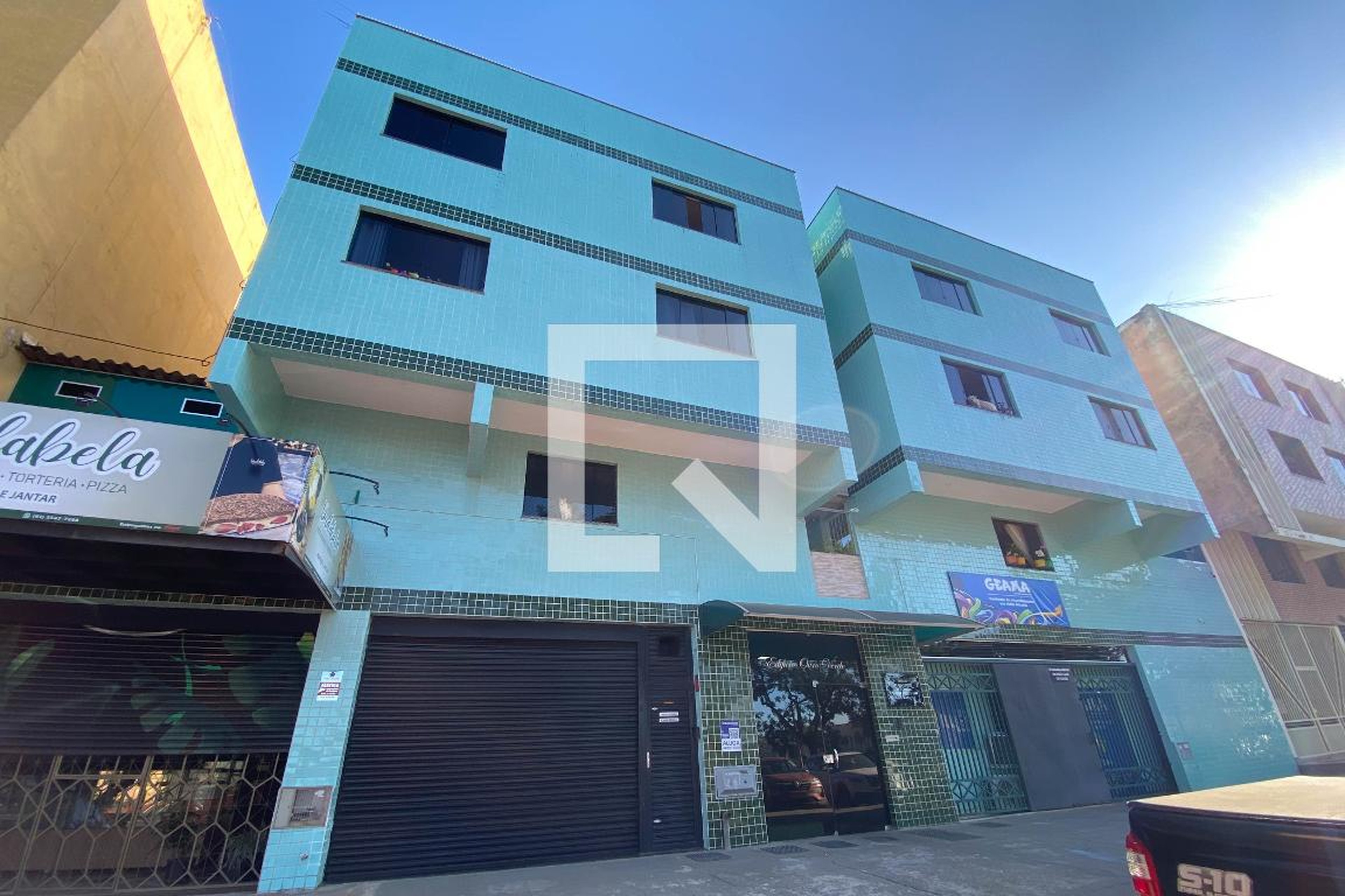 Fachada Condomínio em Avenida Central, 1405