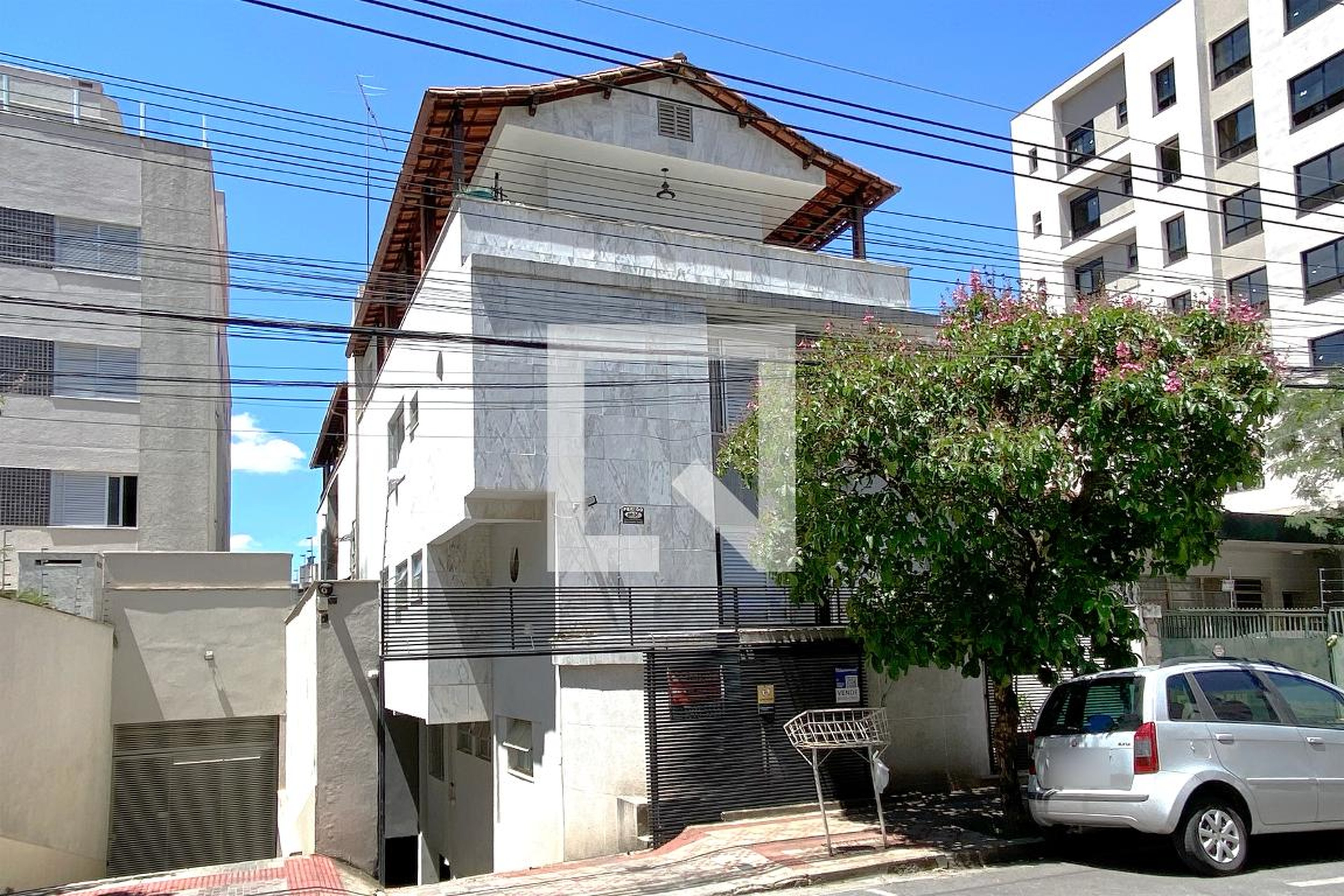 Fachada Condomínio em Rua Cristina, 1290