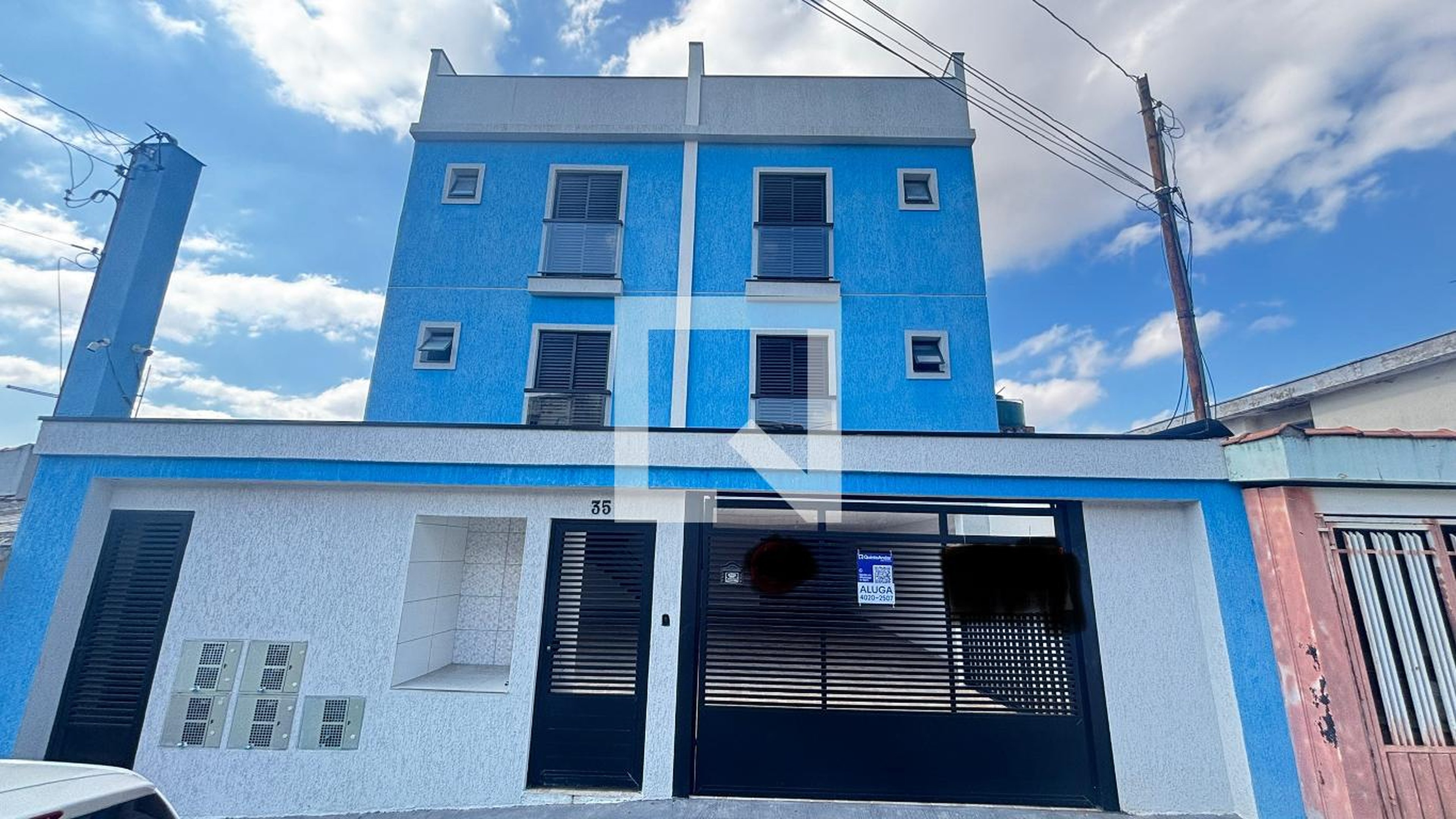 Fachada Condomínio em Rua Canárias, 35