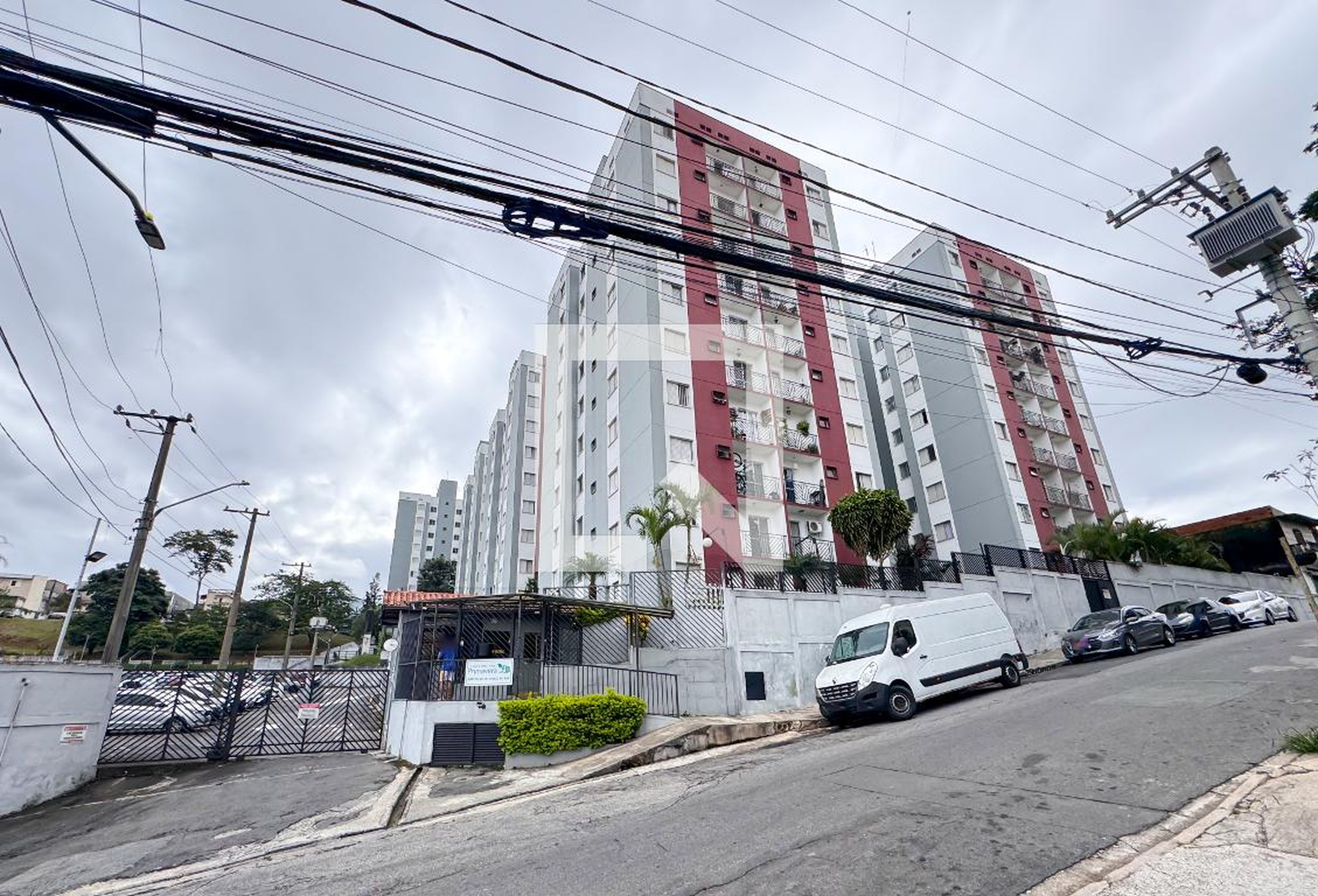 Fachada do Condomínio Condomínio Primavera