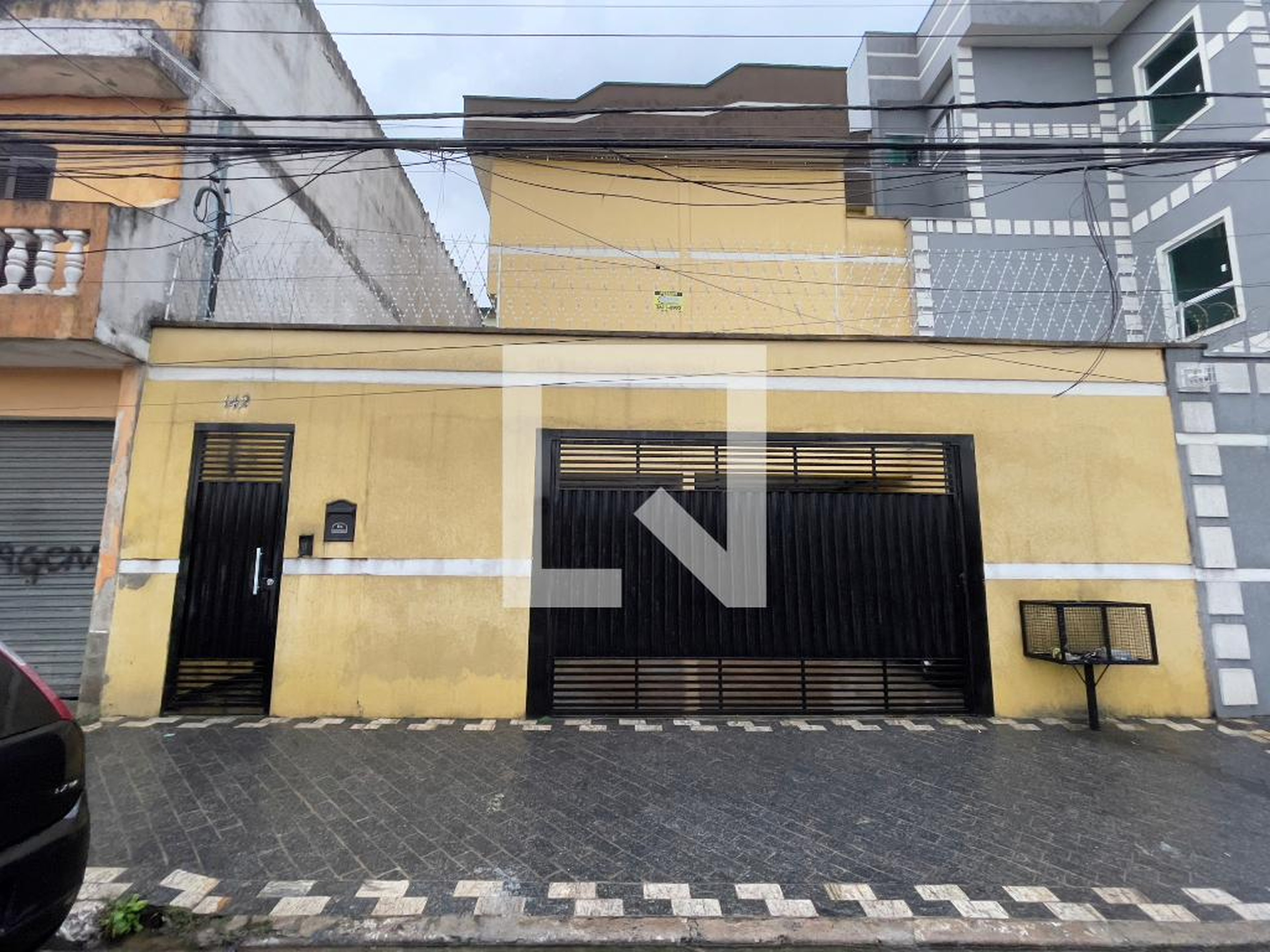 Fachada Condomínio em Rua Fausto Figueira de Melo, 142