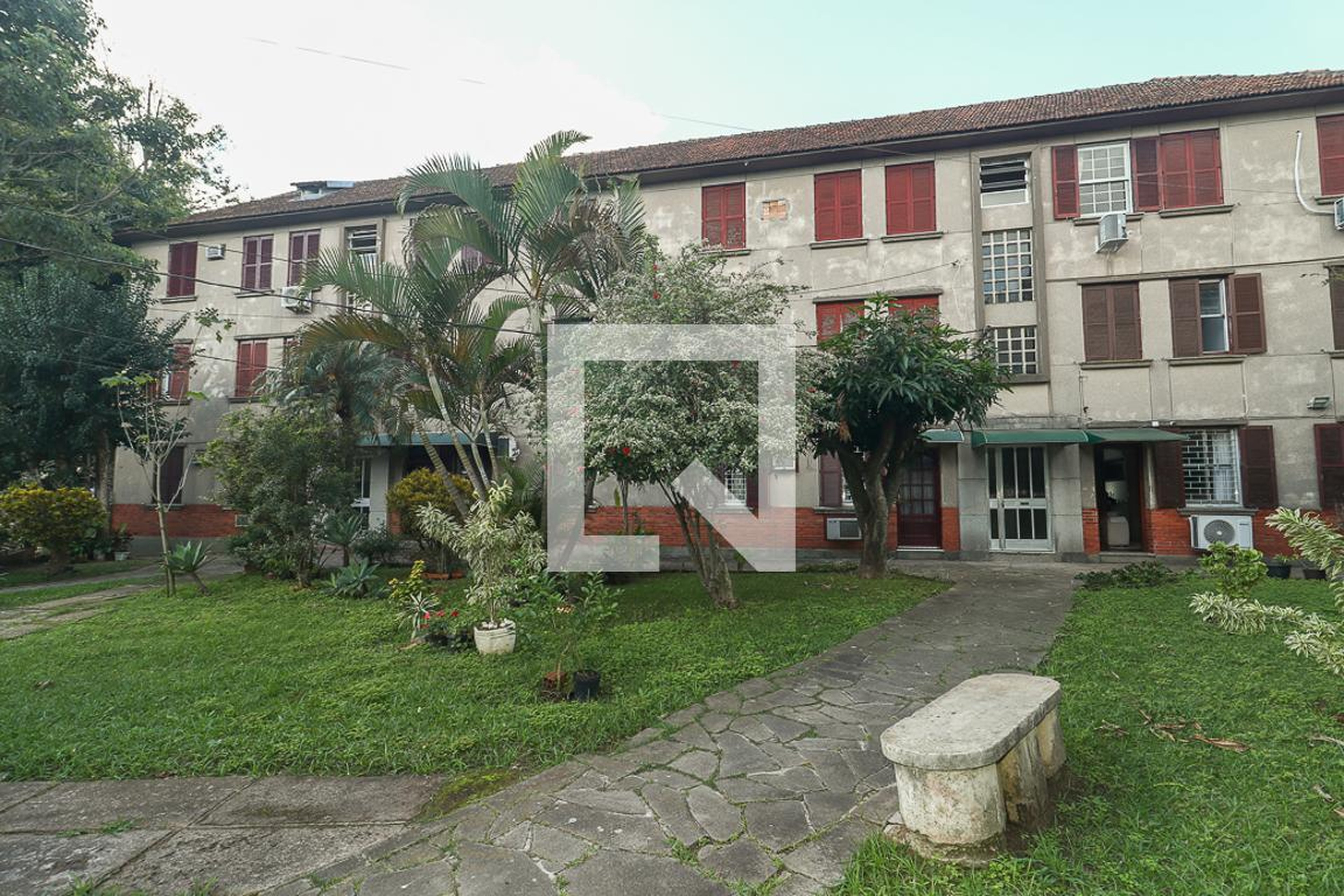 Fachada Condomínio em Rua Tuparaí, 184
