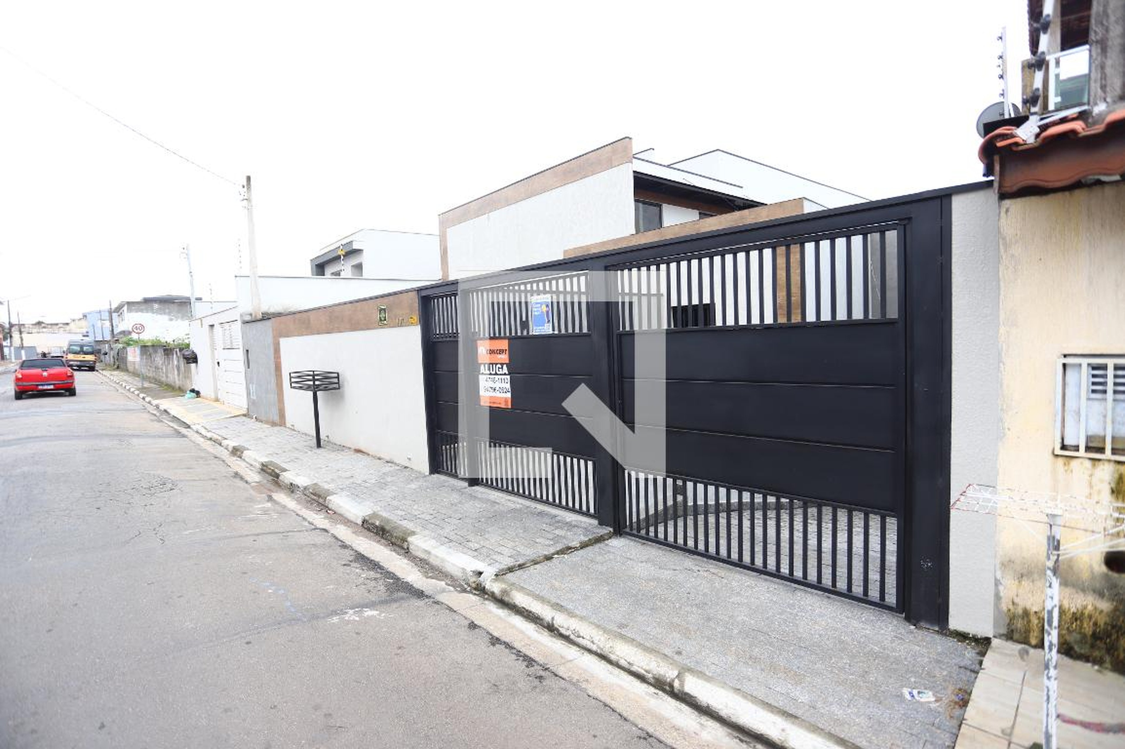 Fachada Condomínio em Rua Paulino Ayres de Barros, 107