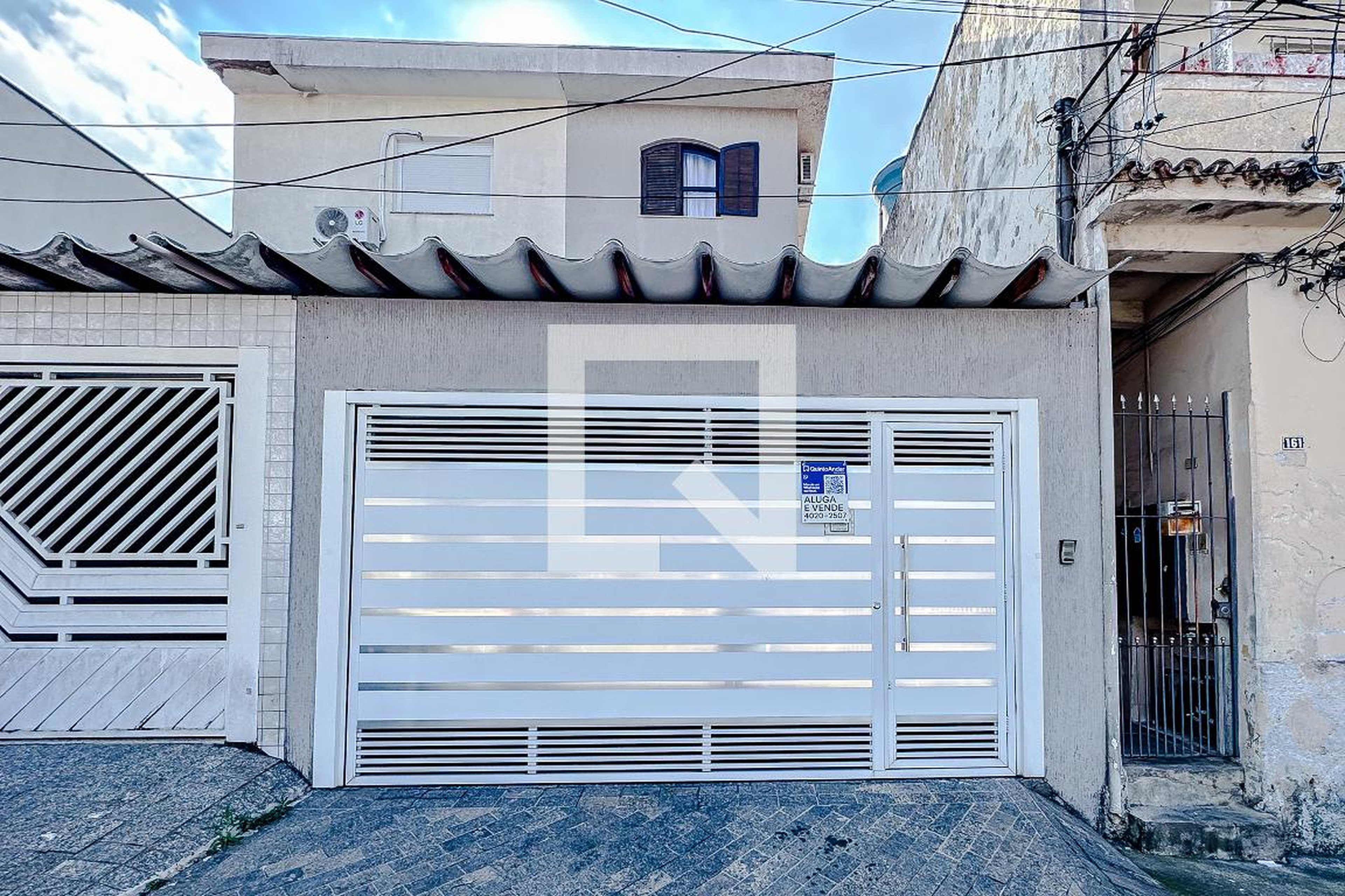 Fachada Condomínio em Rua Antônio Pádua de Oliveira, 157