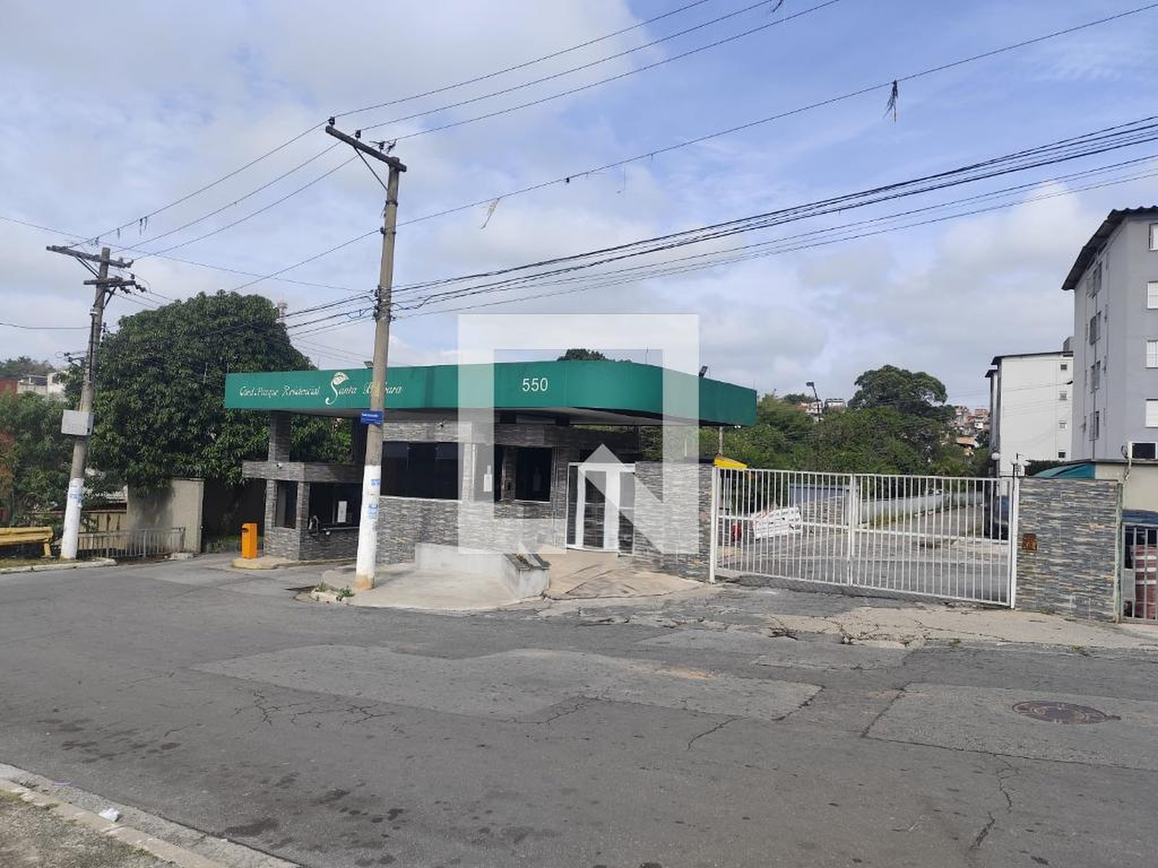 Fachada do Condomínio Condomínio Santa Barbara