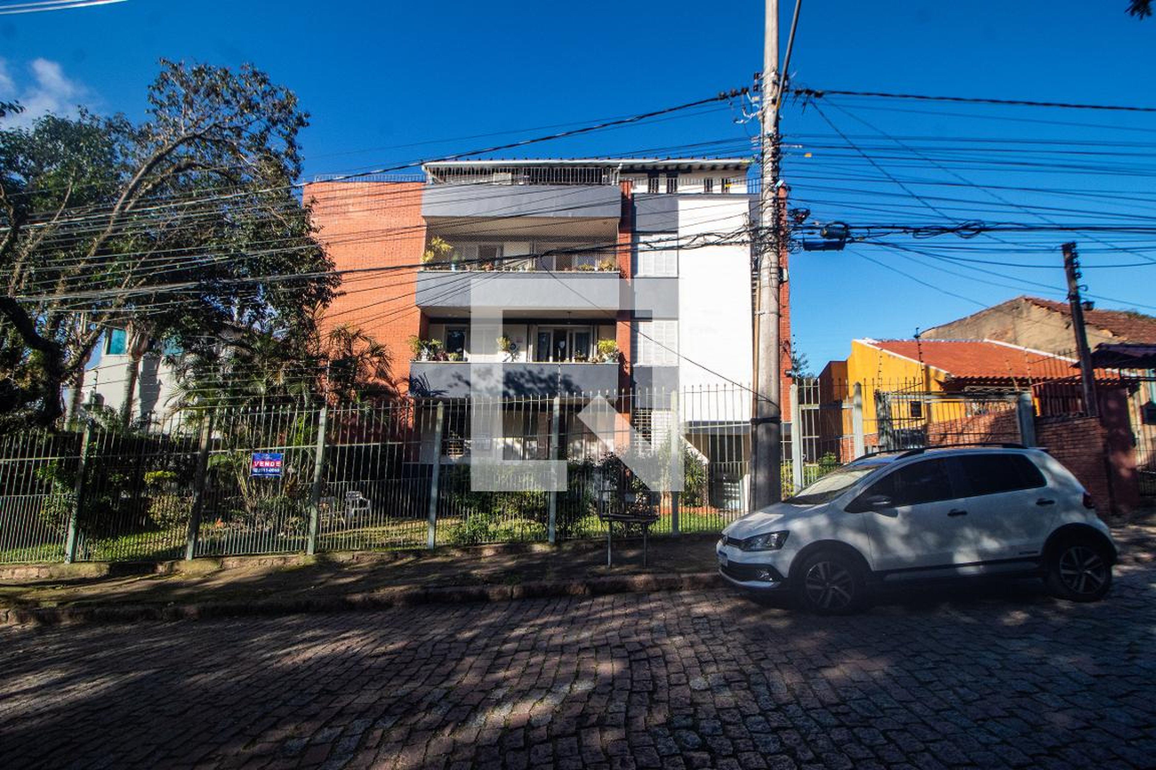 Fachada Condomínio em Rua Delfino Riet, 66