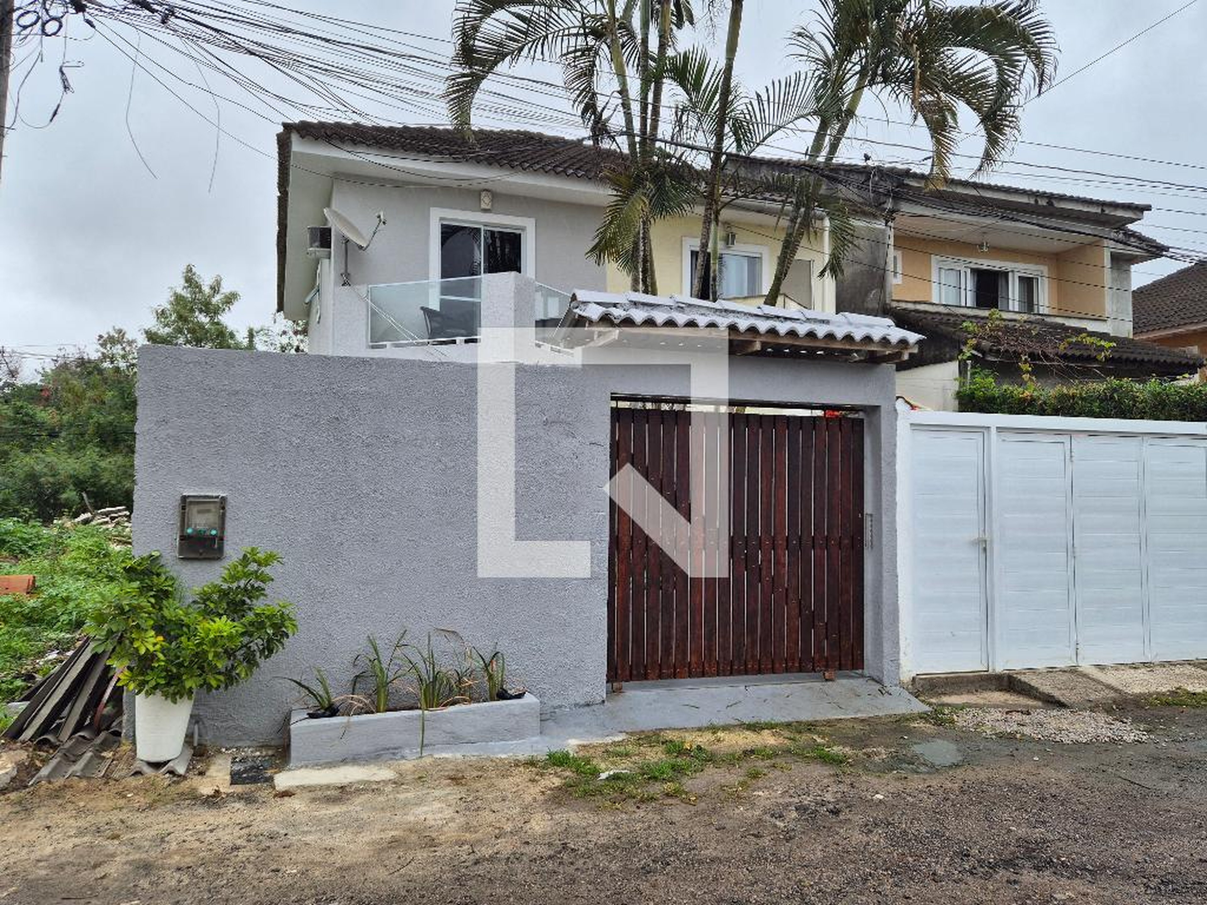 Fachada Condomínio Village New Green