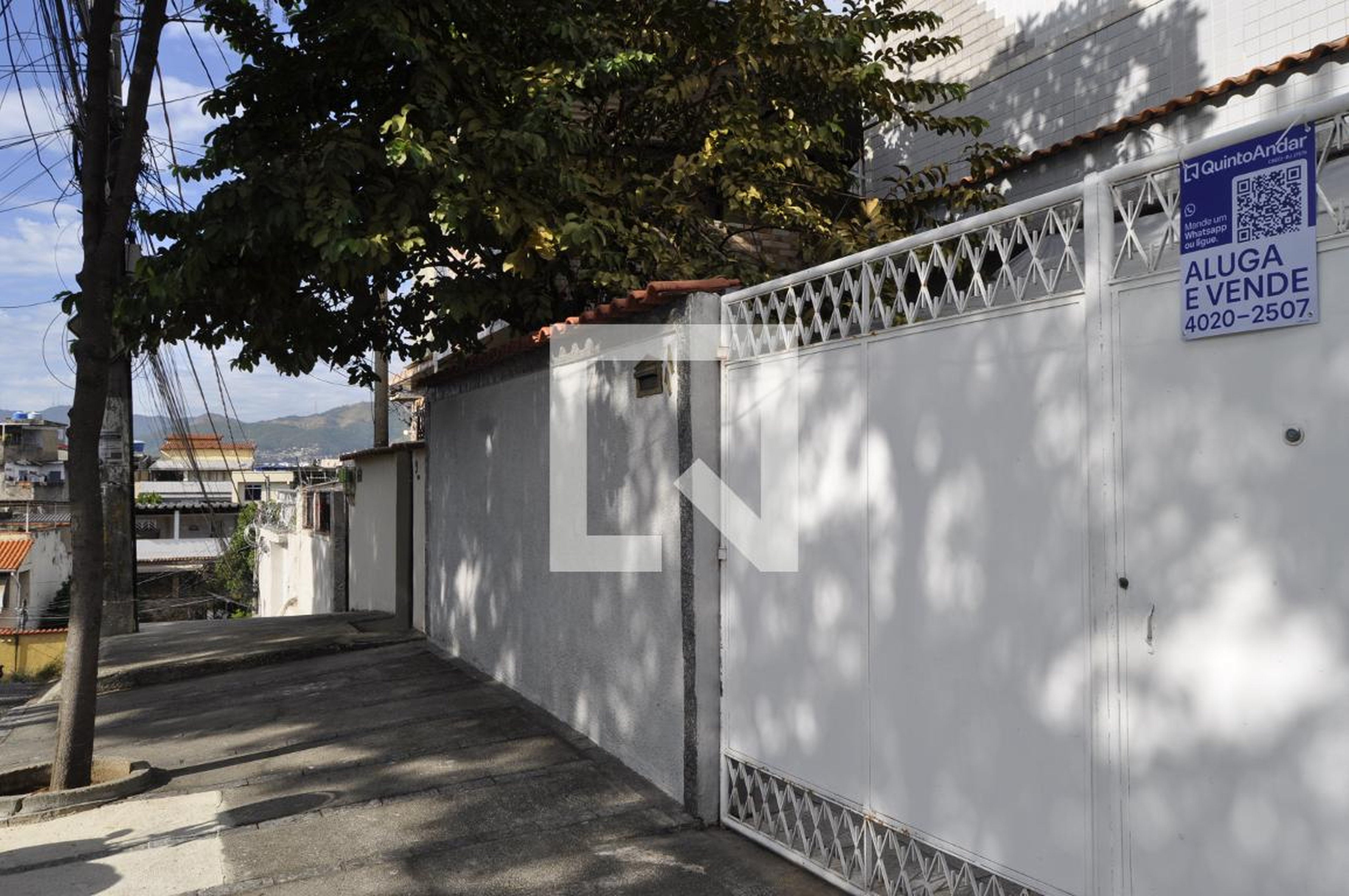 Fachada Condomínio em Rua Xisto Bahia, 11