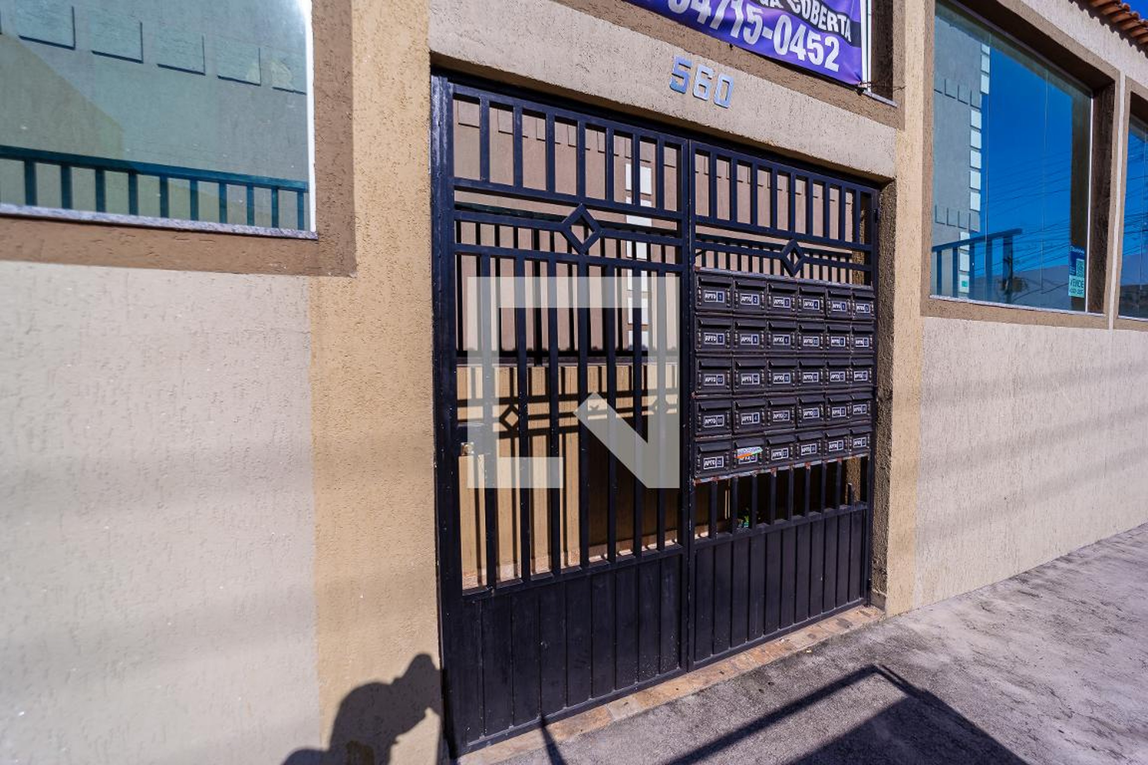 Fachada Condomínio em Rua Antônio Fortunato, 560