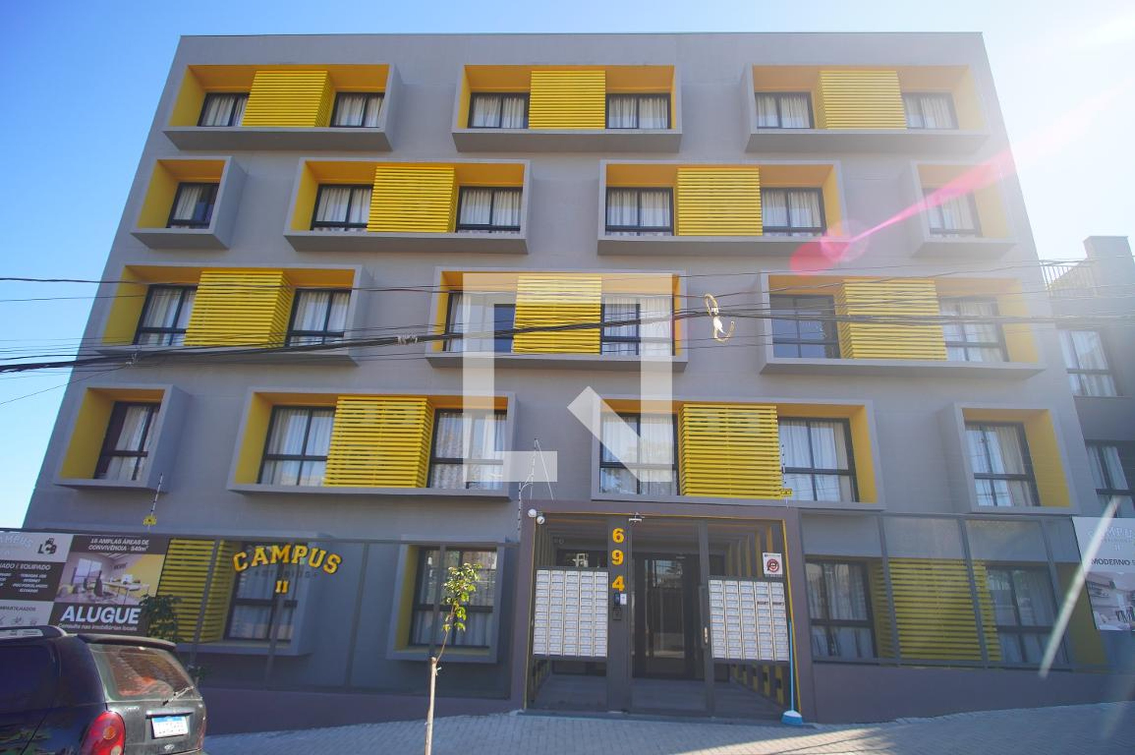 Fachada Condomínio em Rua Arlíndo Pasqualini, 694