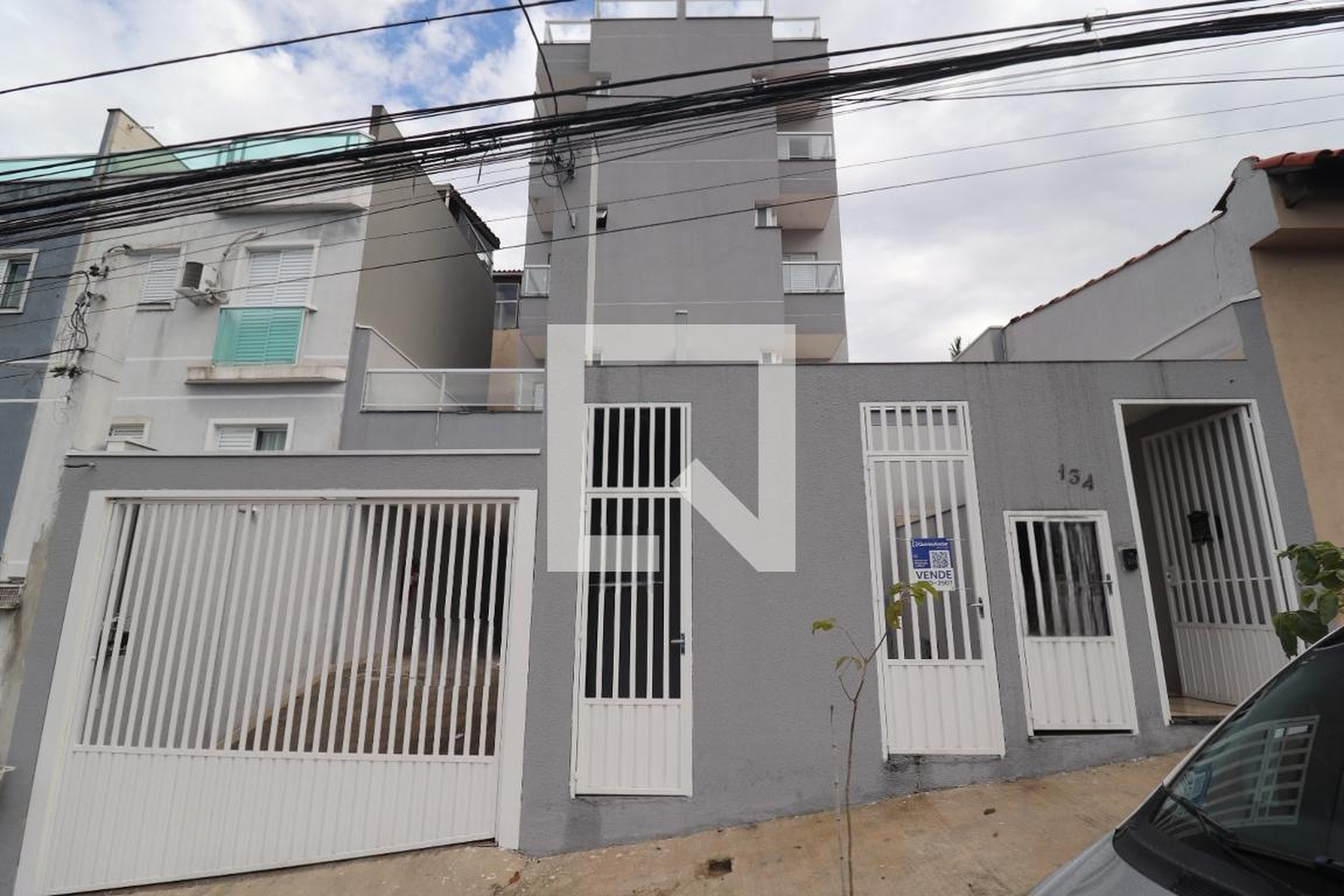 Fachada Condomínio em Rua Itacolomi, 134