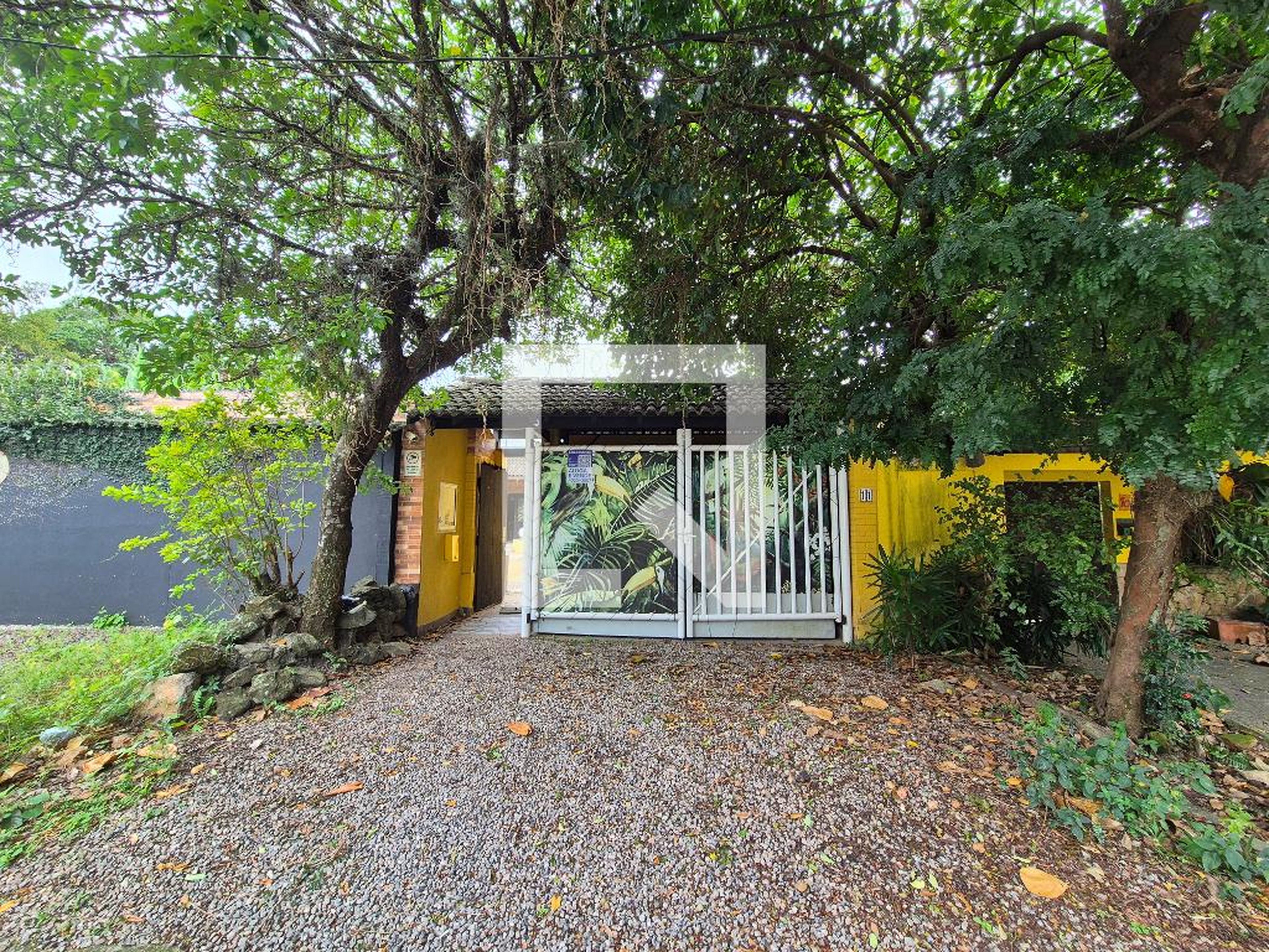 Fachada Condomínio em Rua Orígenes Lessa, 11