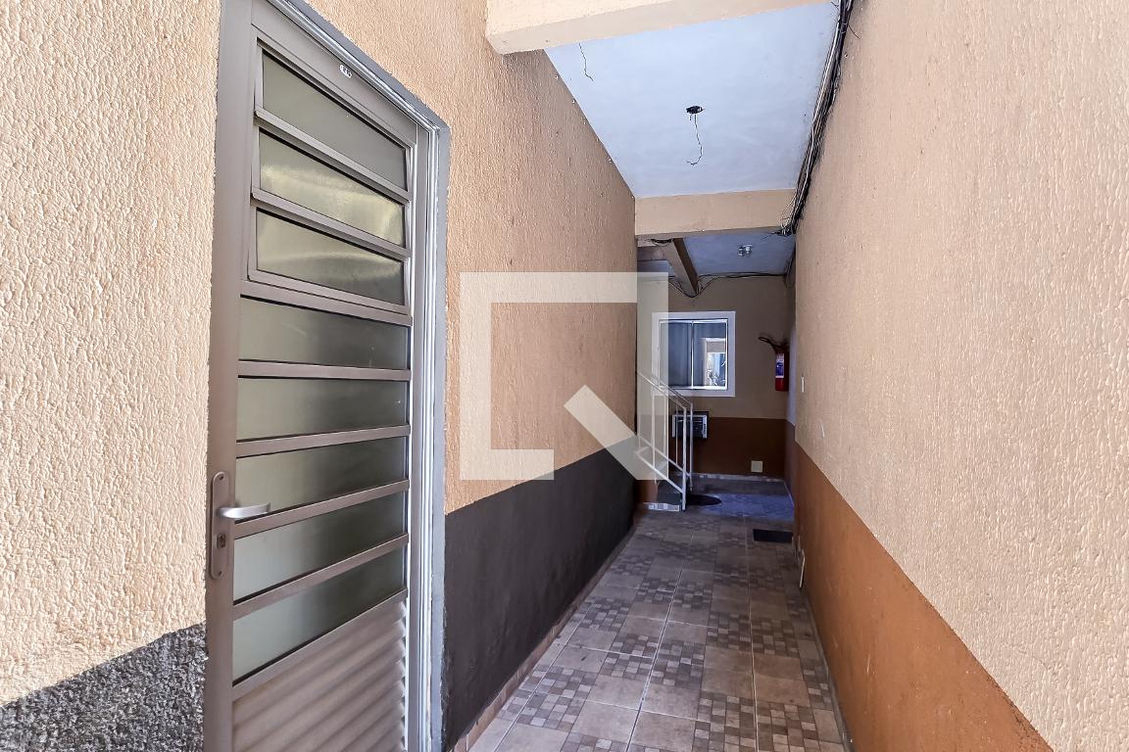 Entrada Condomínio em Rua Ana Quintão, 445