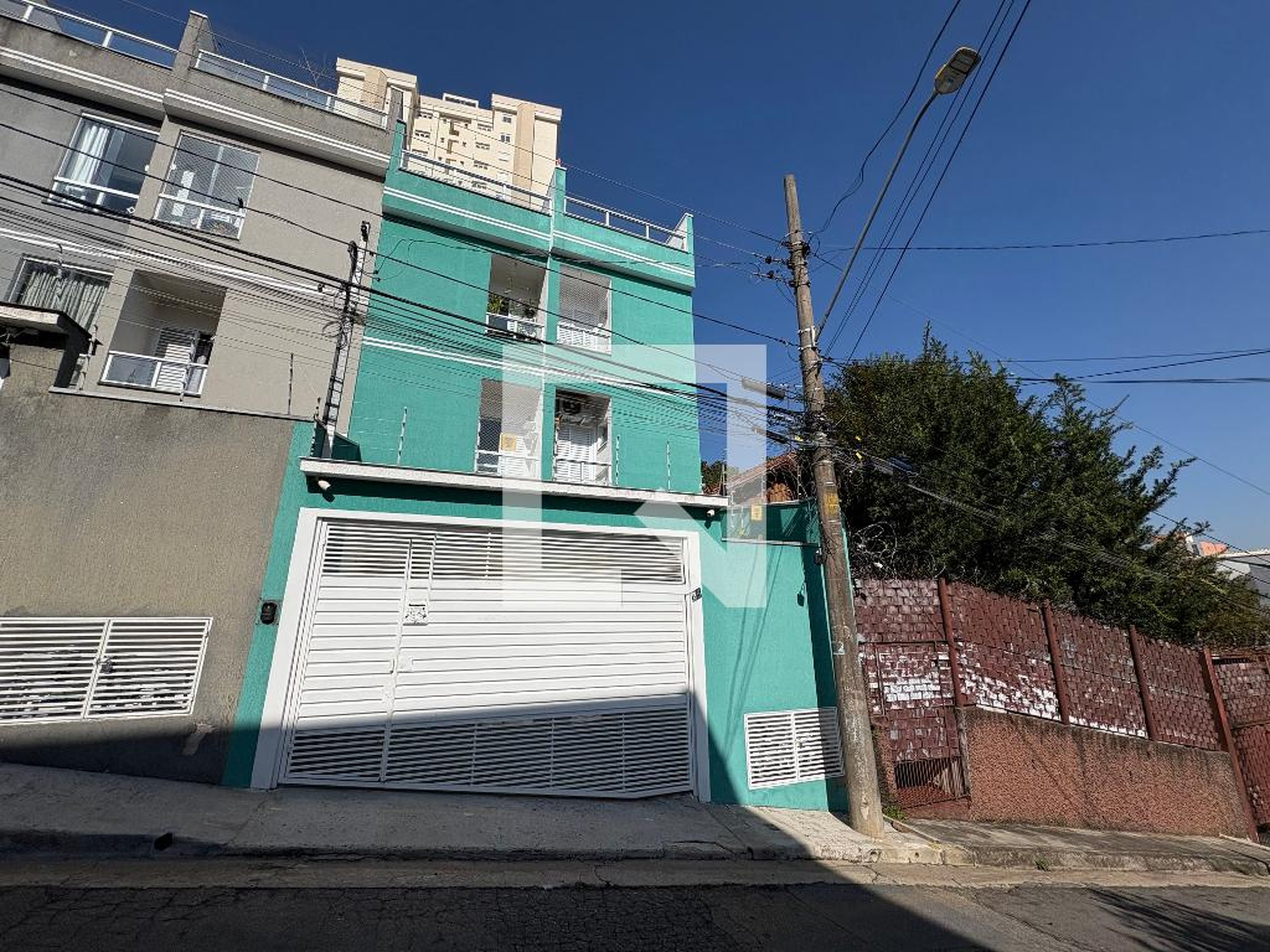 Fachada Condomínio em Travessa Clemente Ferreira, 25