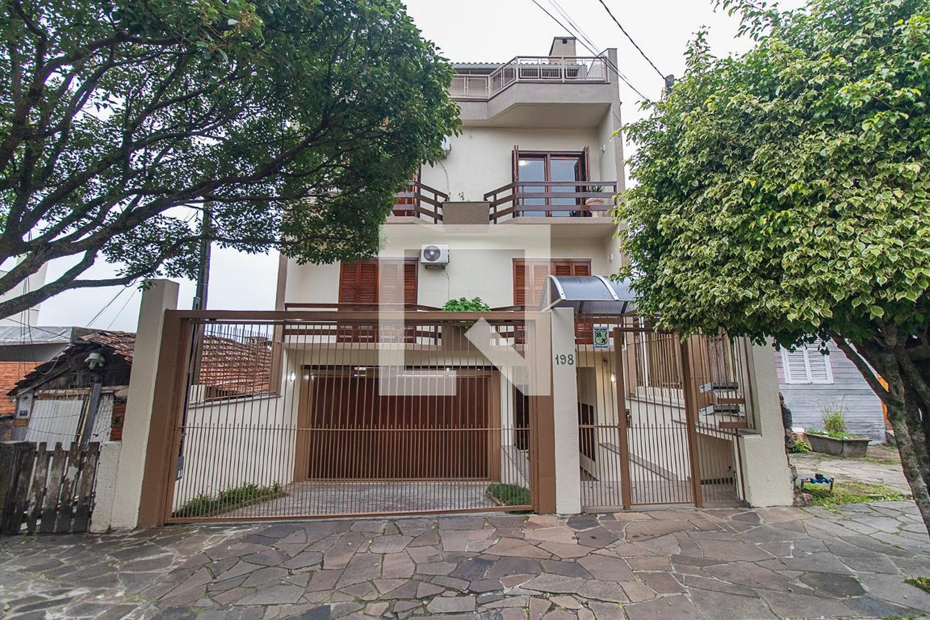 Fachada Condomínio em Rua Joaquim Cruz, 198