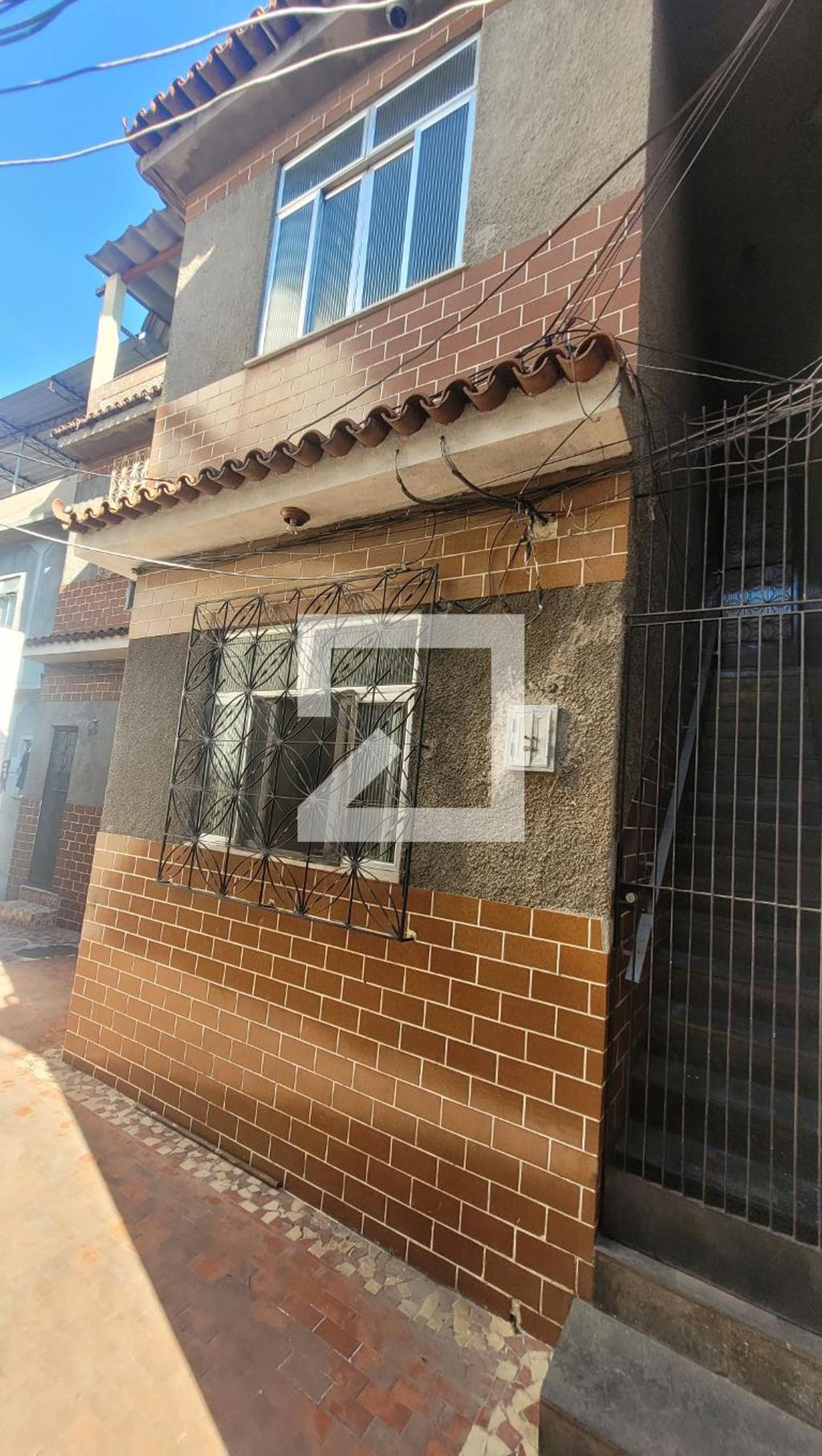 Fachada Condomínio em Rua Ludgéro Pinho, 42