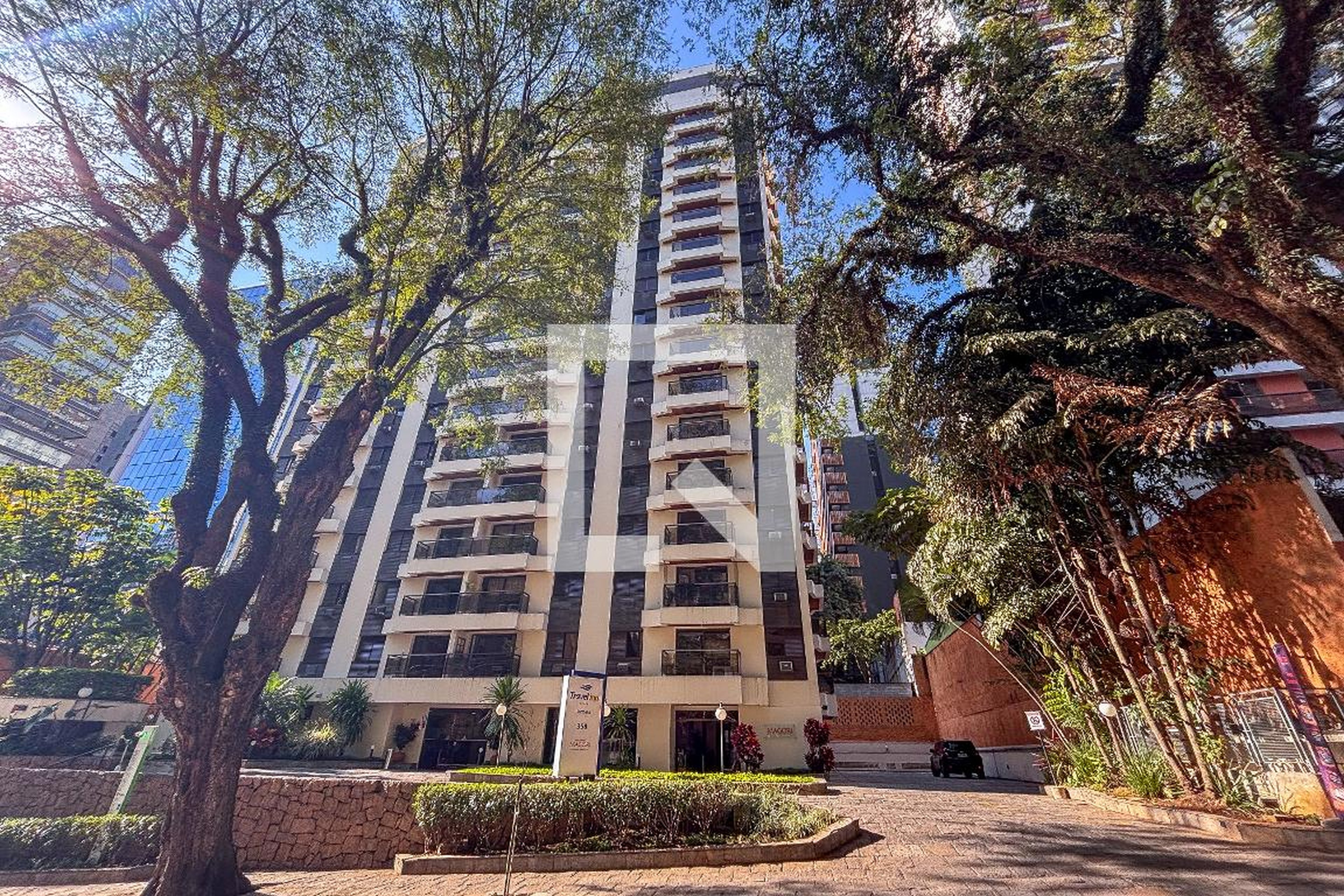 Fachada Condomínio Travel in