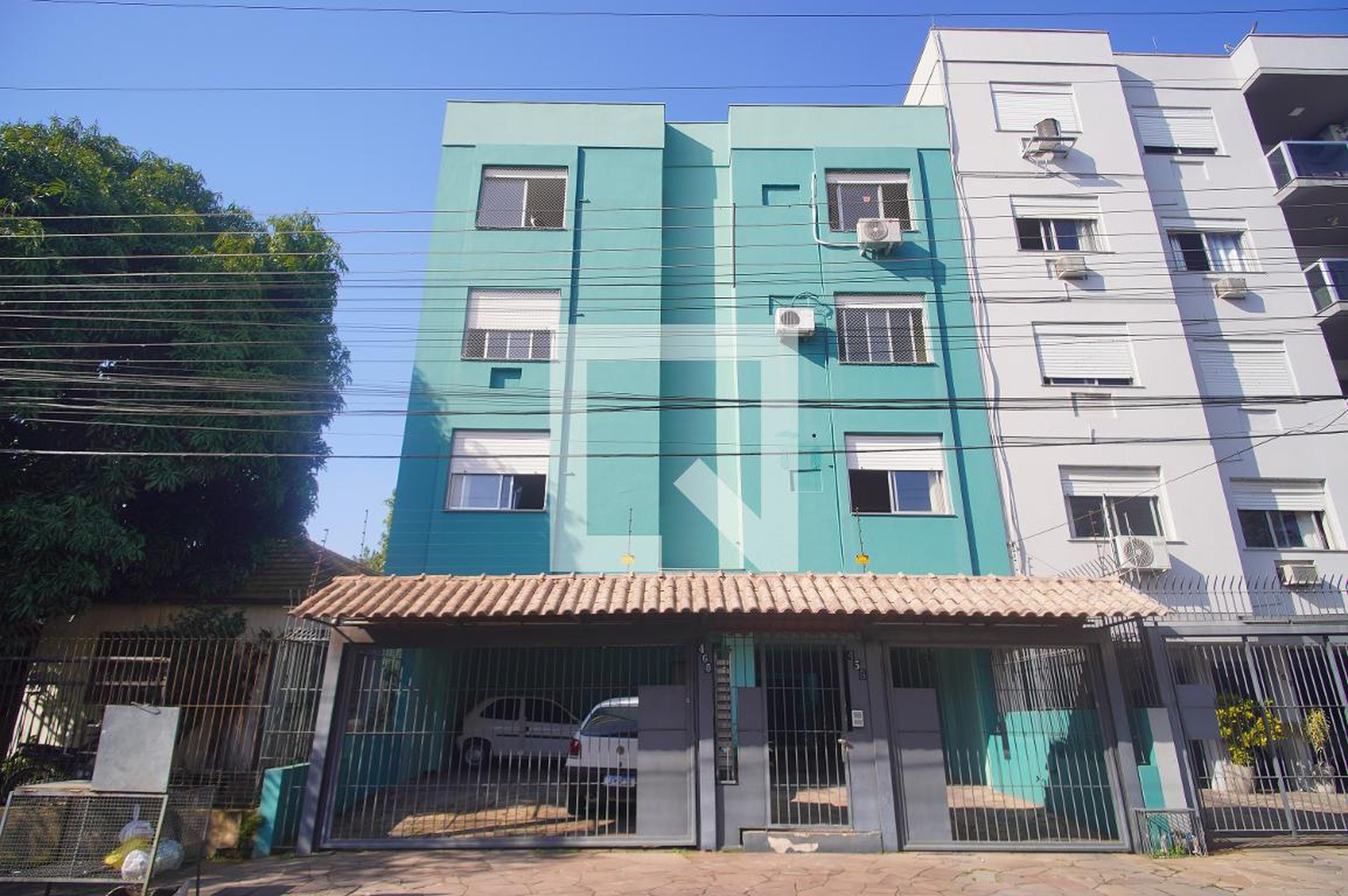 Fachada Condomínio em Rua Caçador, 458