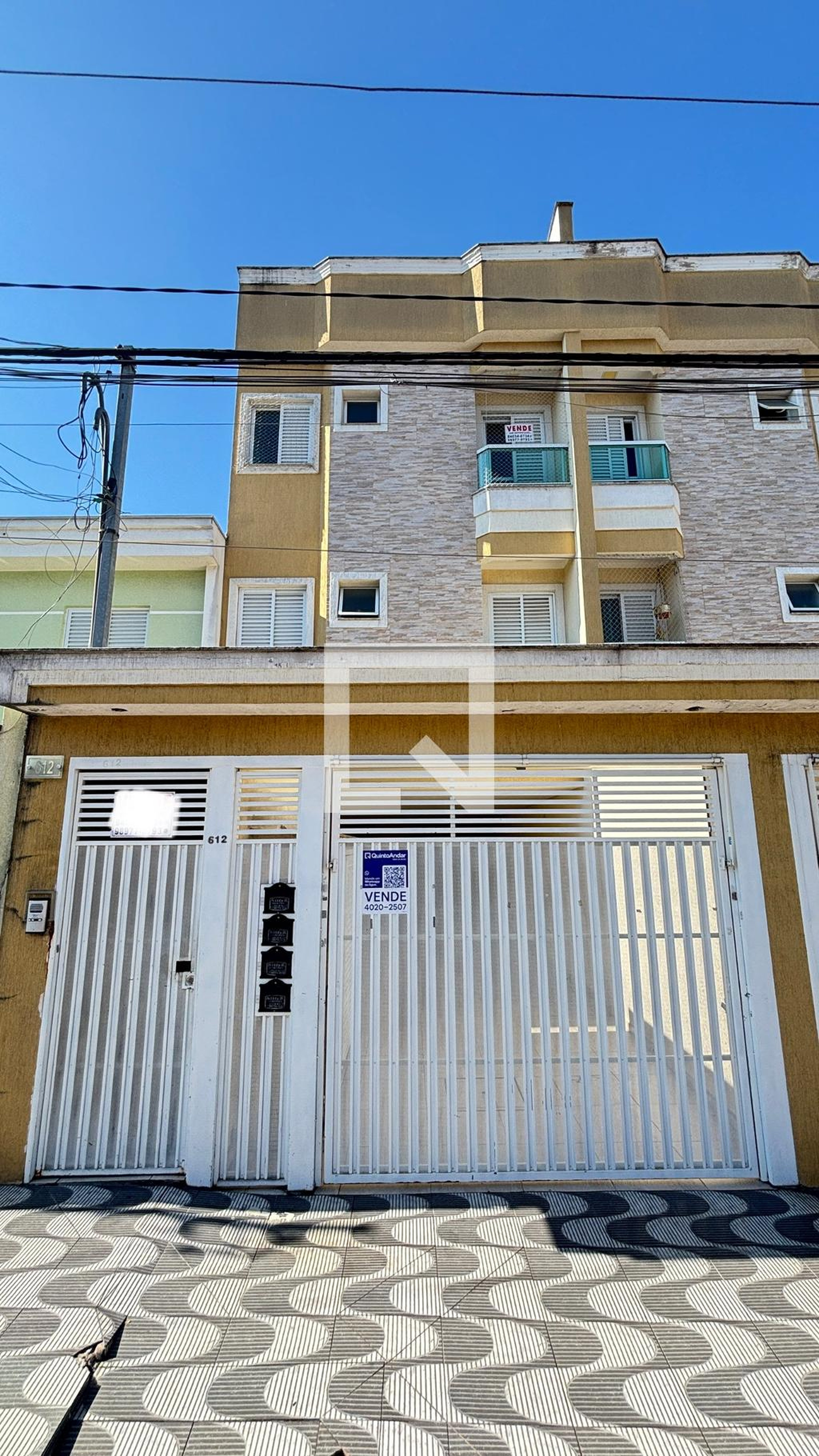 Fachada Condomínio em Rua Sud Menucci, 612