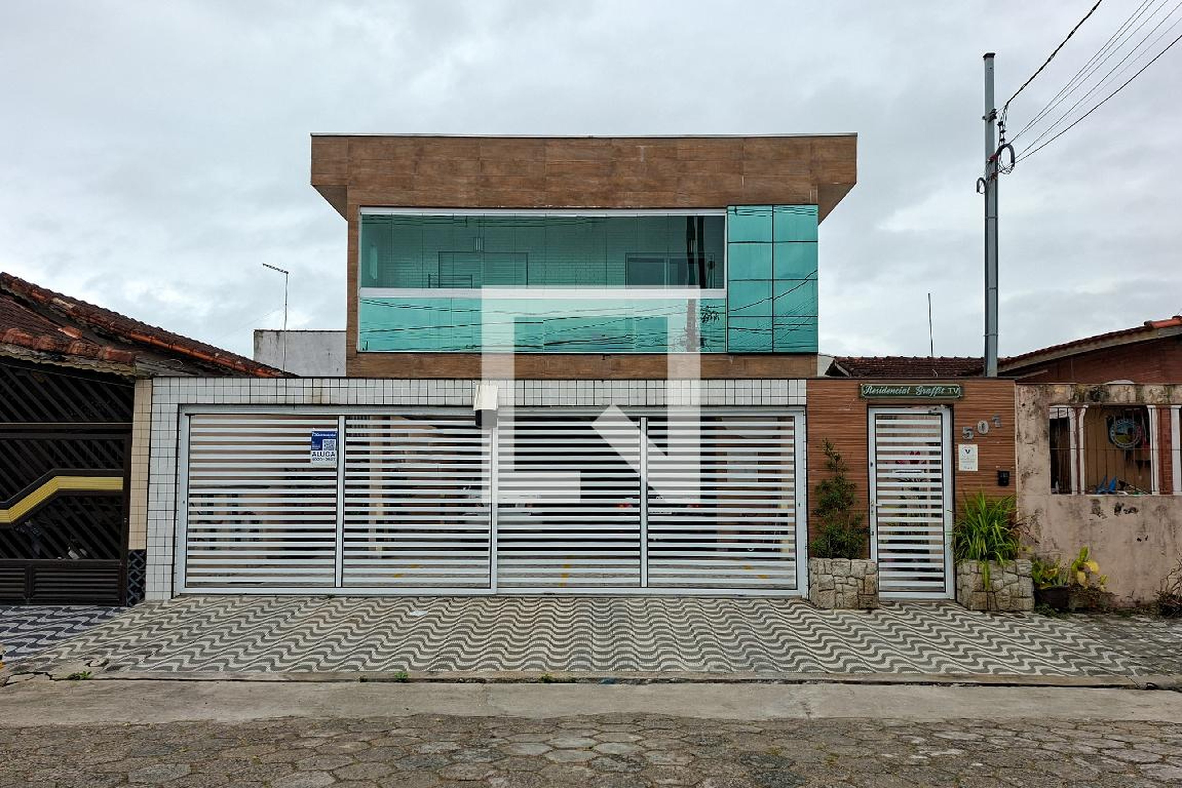 Fachada Condomínio em Avenida Roberto Muzzi, 501