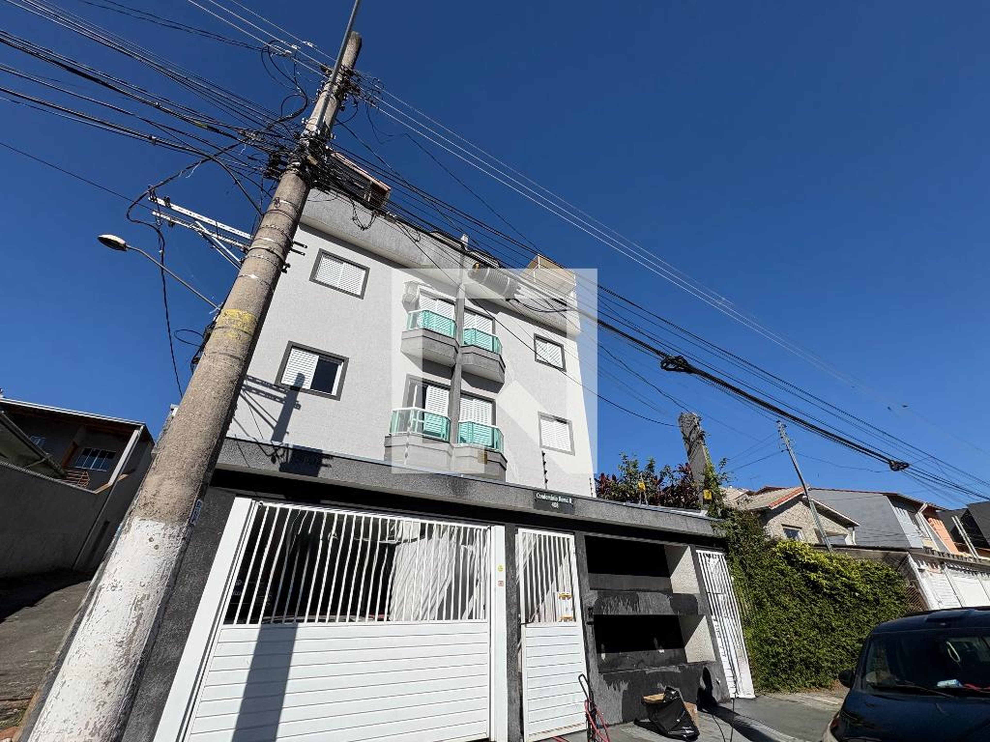 Fachada Condomínio em Rua Catigua, 408
