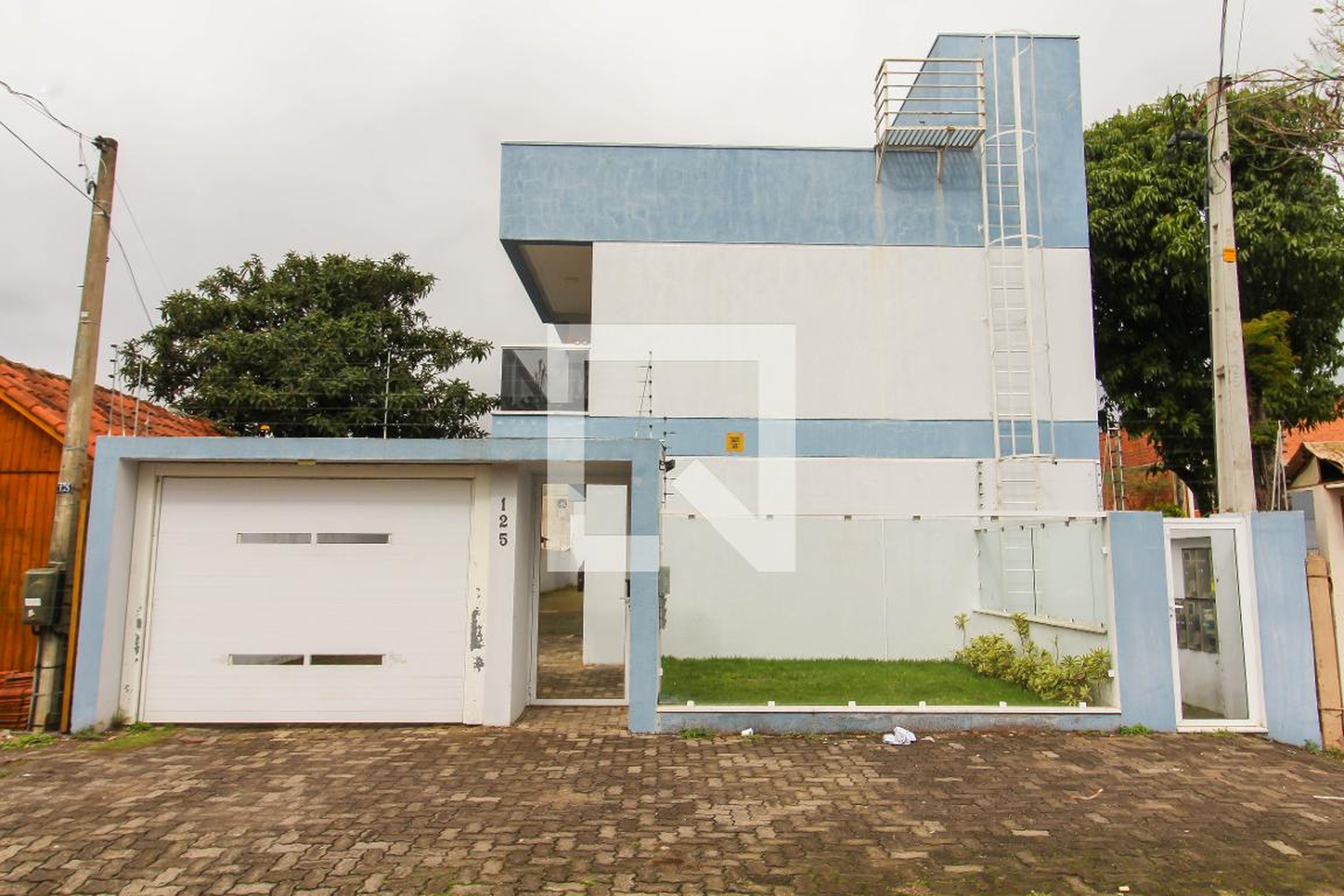 Fachada Condomínio em Rua Protásio Alves, 125