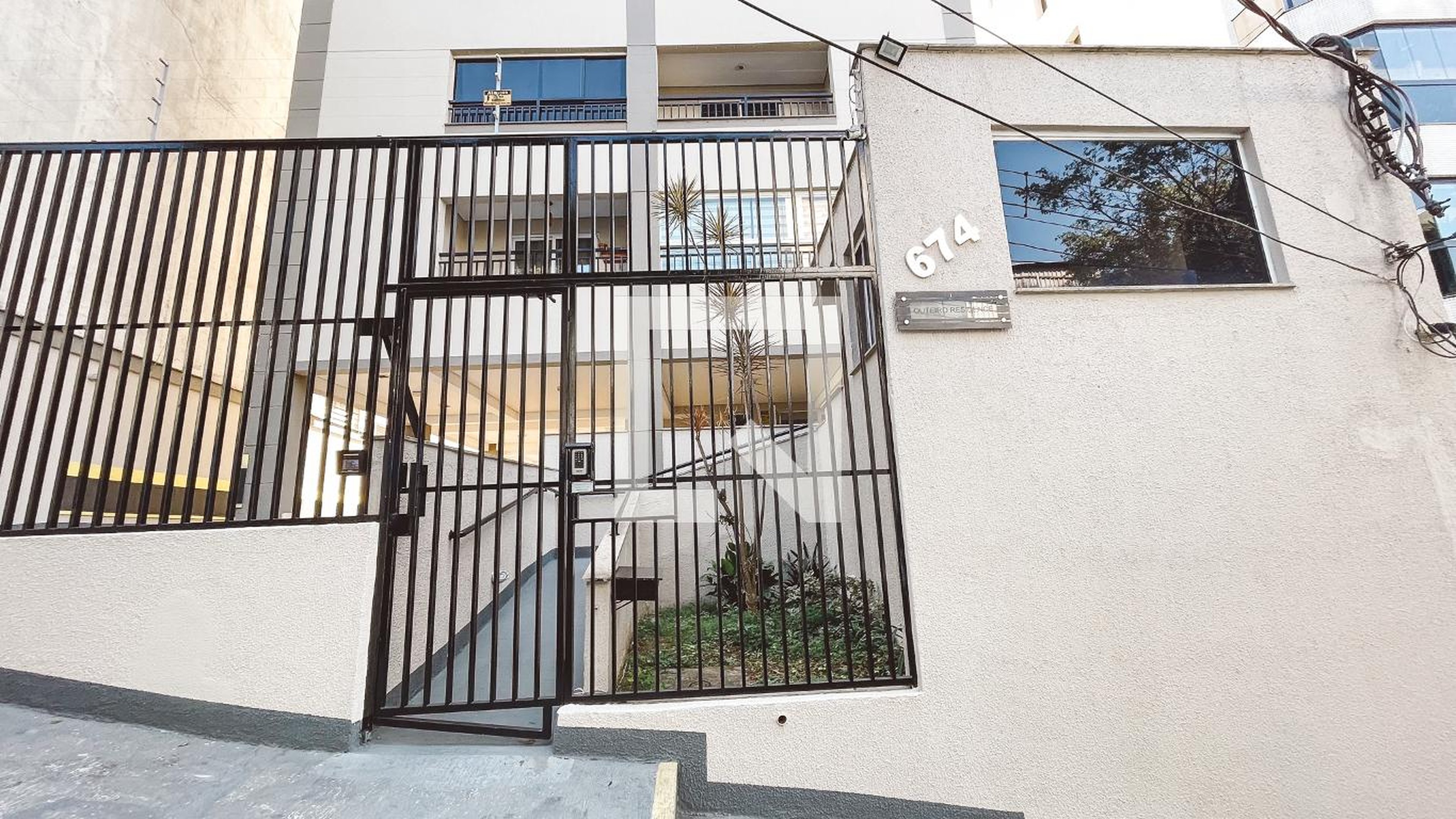 Fachada do Prédio Condomínio Outeiro  Residence