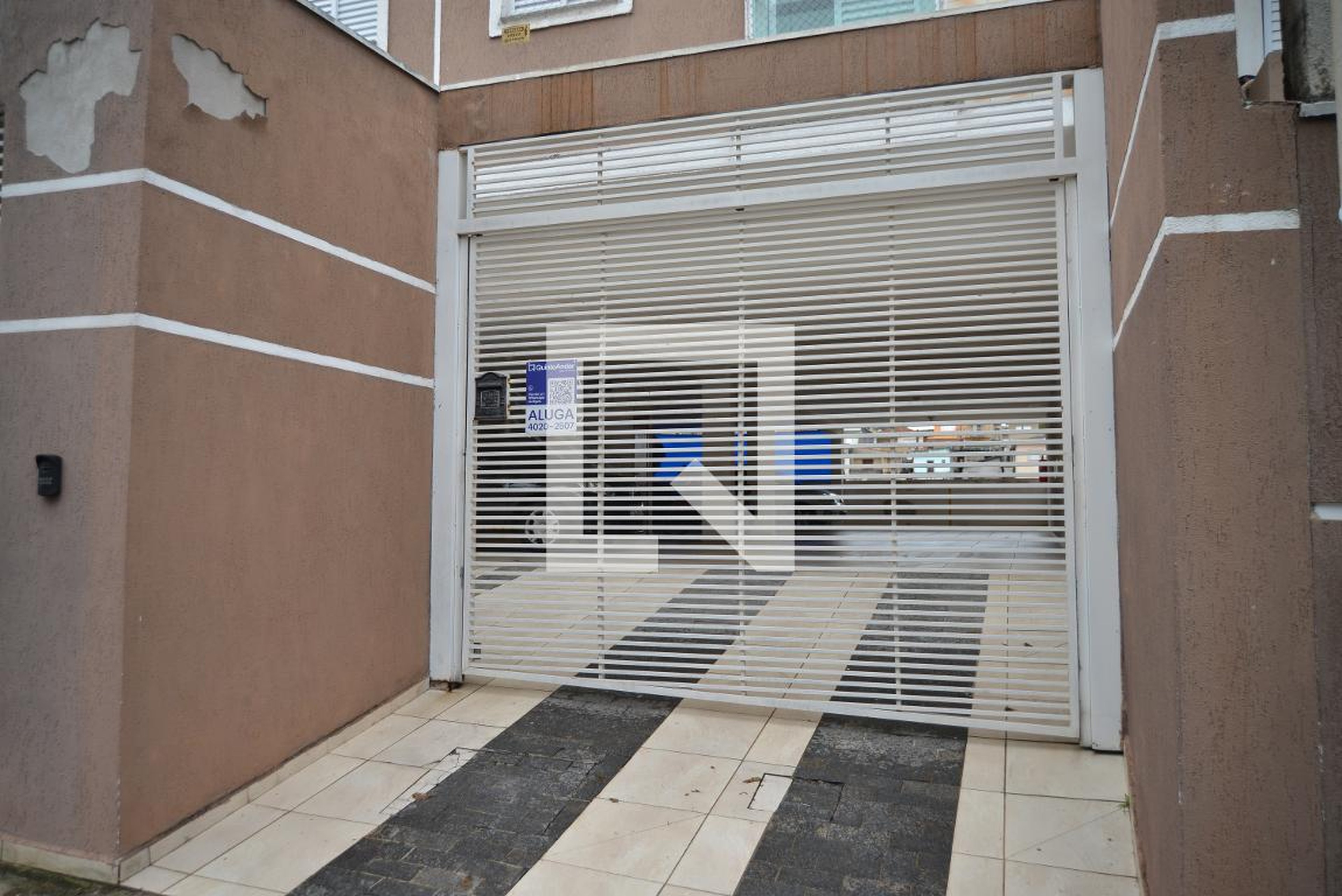 Fachada Condomínio em Rua Martinho Prado, 87