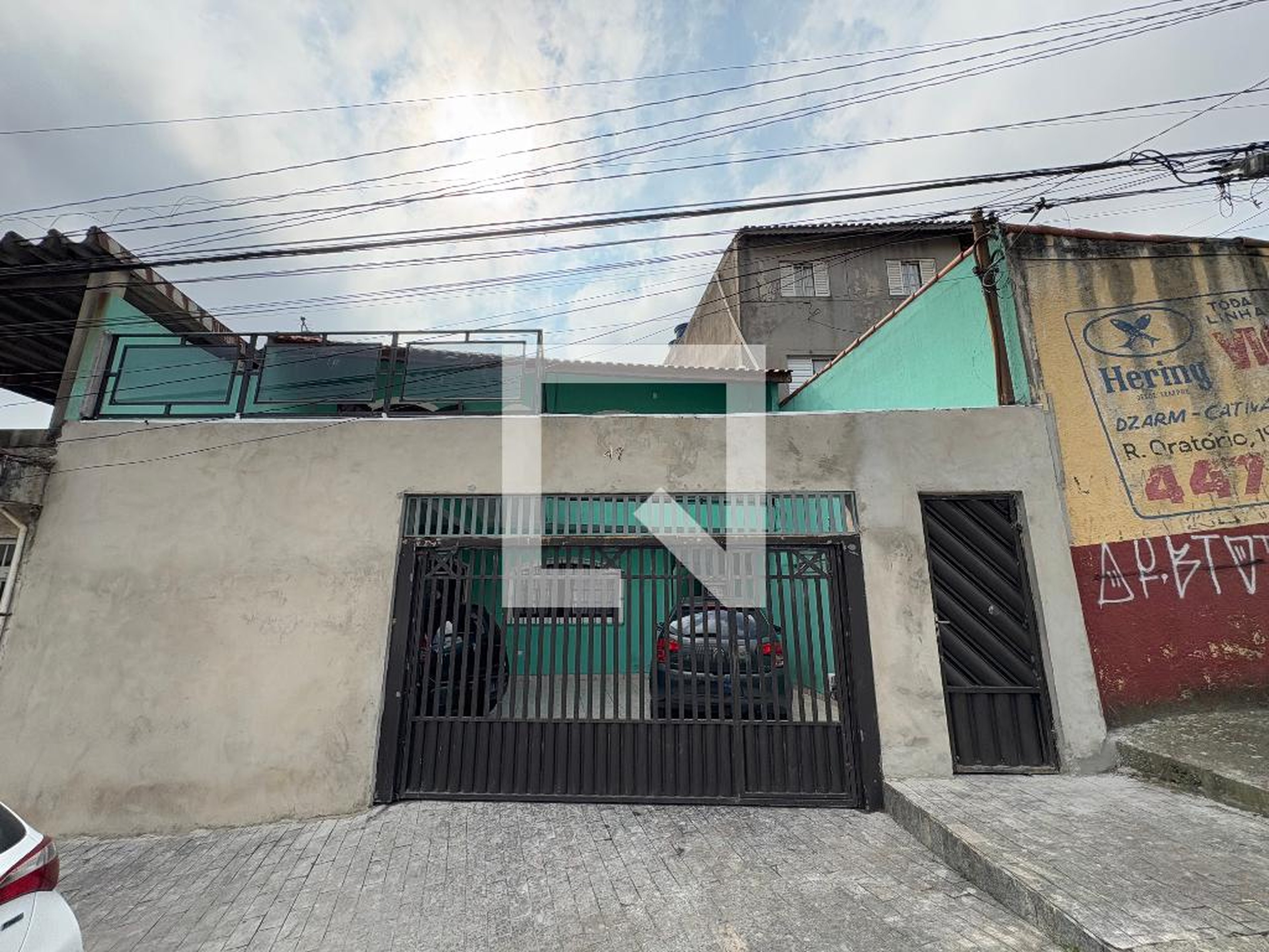 Fachada Condomínio em Rua Adriana Prieto, 47