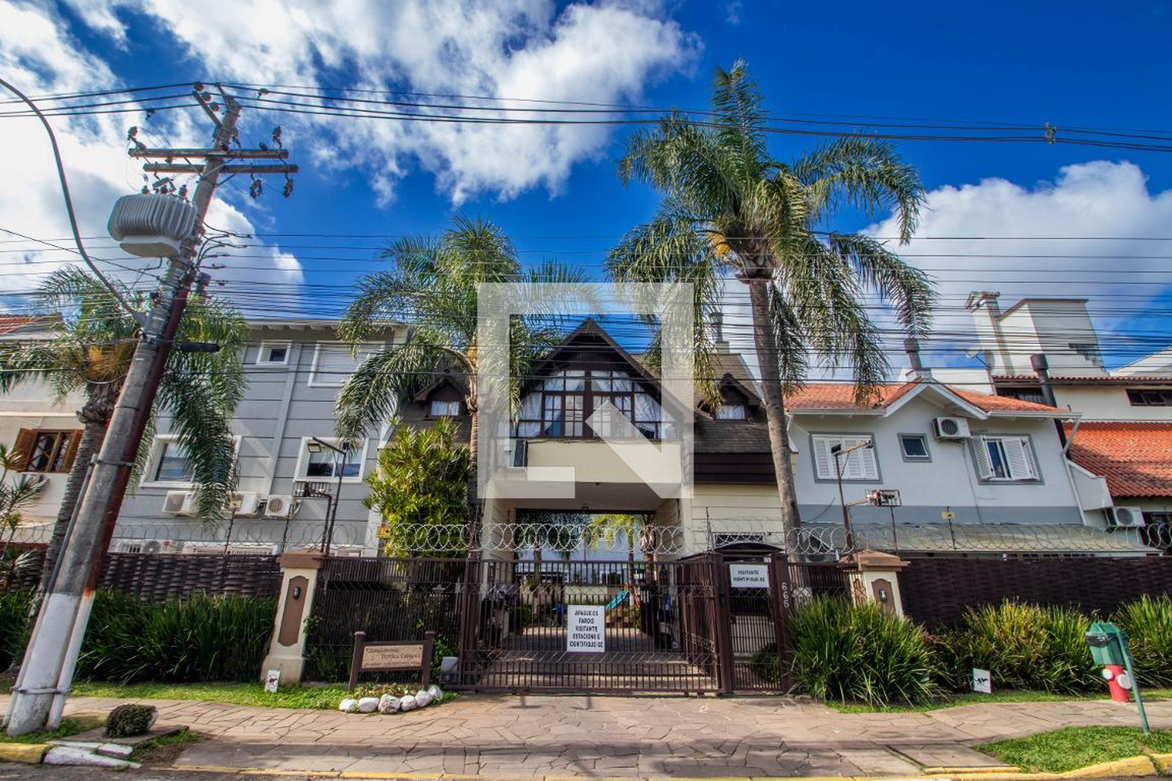 Fachada do Condomínio Condomínio Verdes Campos