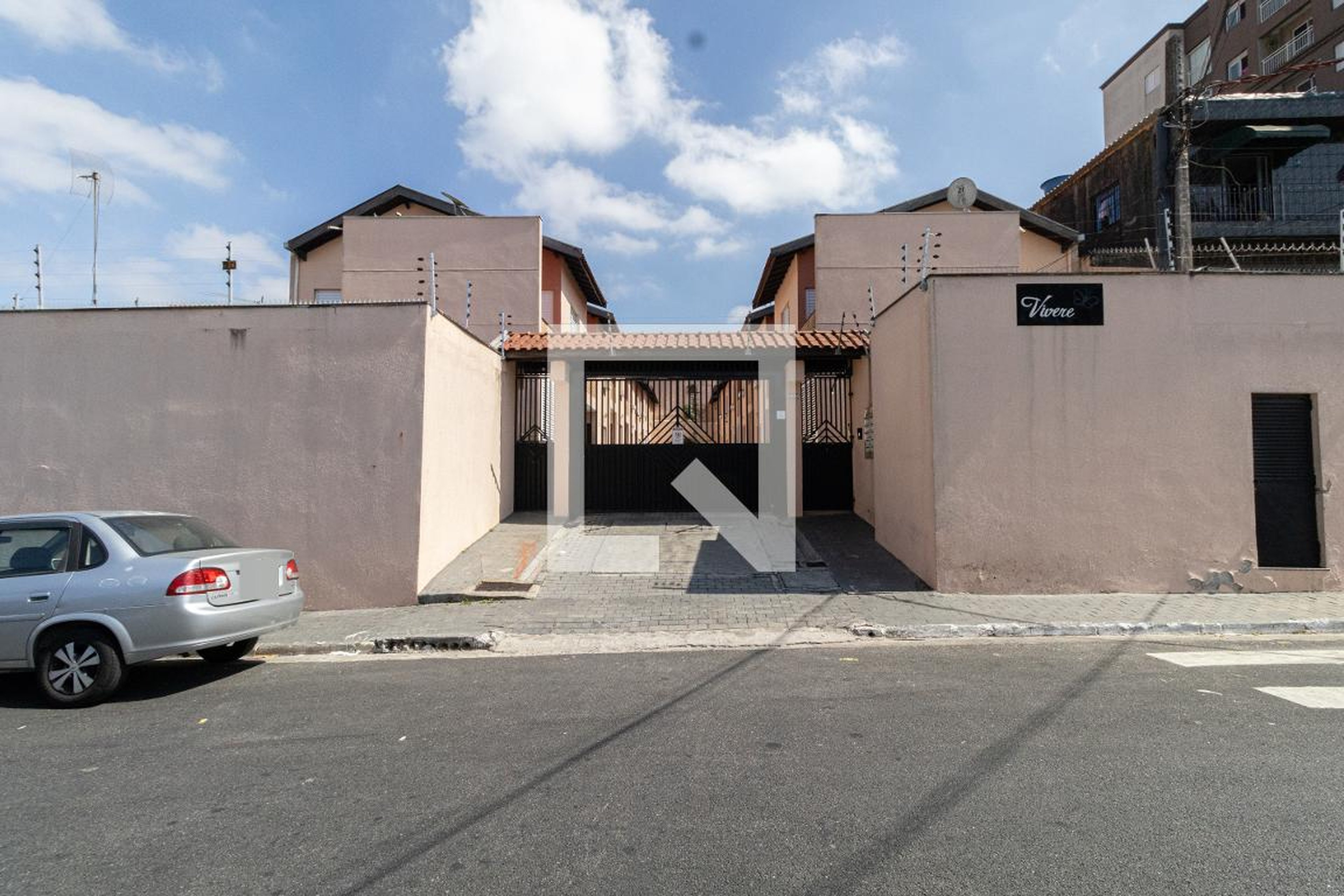 Fachada Condomínio em Rua Coronel Rodolfo Porto, 350