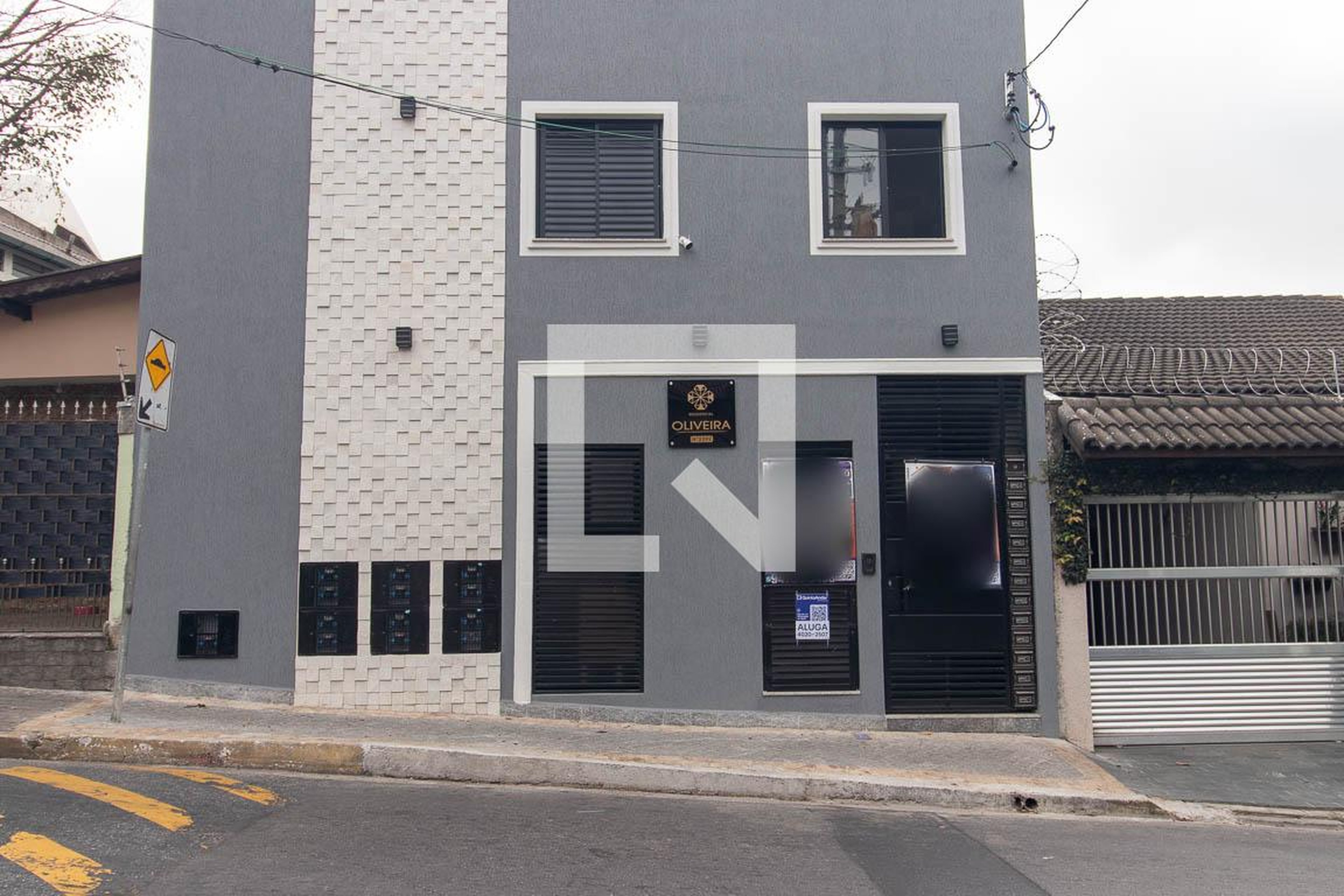 Fachada Condomínio em Rua Tanque Velho, 2291