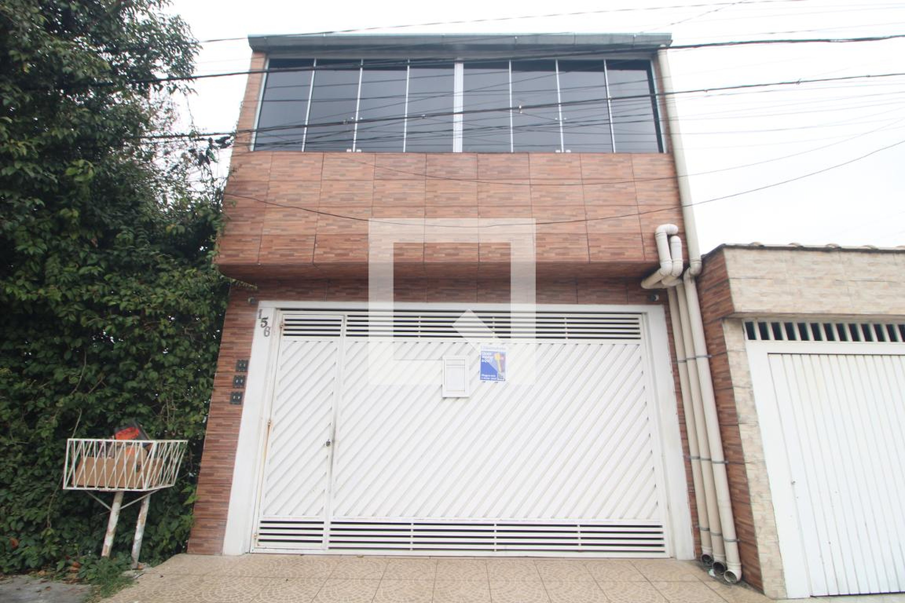 Fachada Condomínio em Rua Reynaldo Manuel, 156