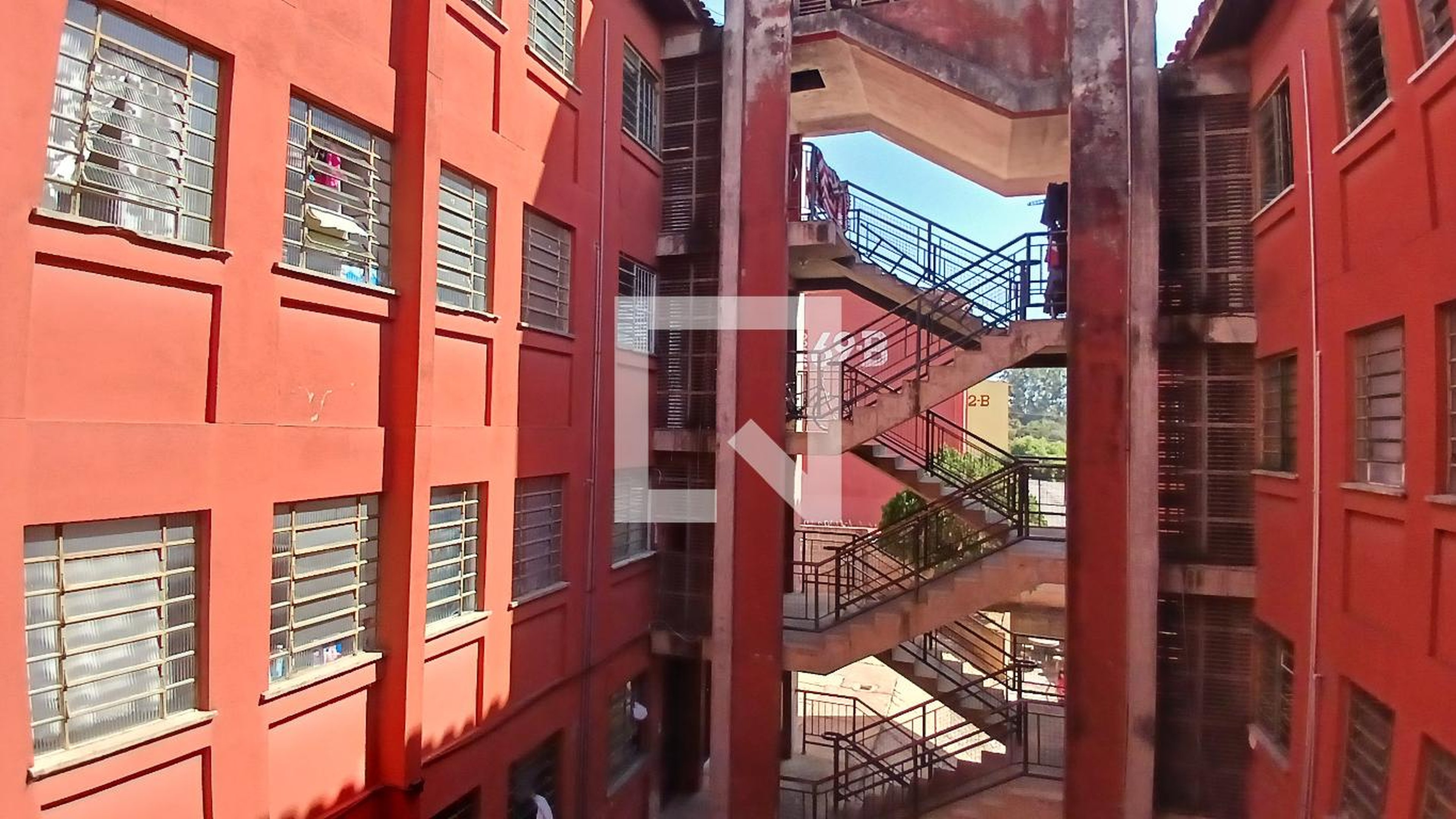 Fachada Condomínio em Rua Uva Itália, 68b